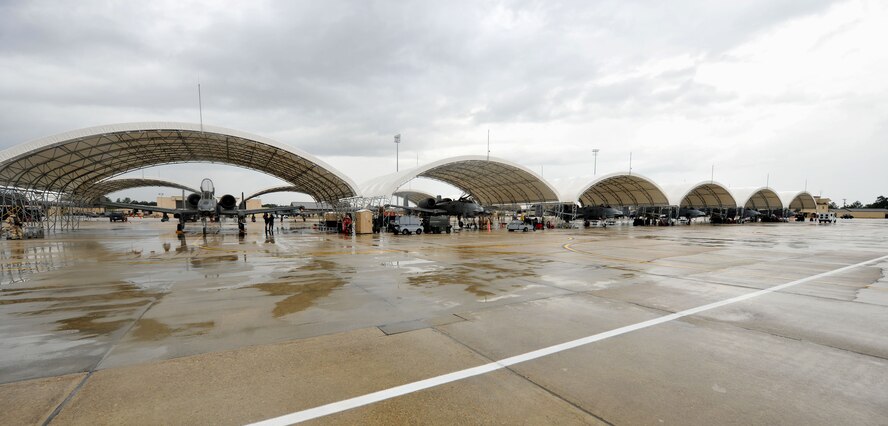 MOODY AIR FORCE BASE, Ga.-- A group of A-10C Thunderbolt II aircraft sit on the flightline waiting to be loaded with munitions during a Phase II Operational Readiness Exercise Nov. 16. The aircraft pilots must wait for maintainers to complete a safe and proper load before takeoff is cleared. (U.S. Air Force Photo/Airman 1st Class Joshua Green)(RELEASED)  