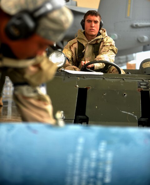 MOODY AIR FORCE BASE, Ga.-- Airman 1st Class Stephen Davarich, 74th Aircraft Maintenance Unit weapons armament systems specialist, waits for munitions to be loaded onto the lift during a Phase II Operational Readiness Exercise Nov 16. Airmen from the 23rd Aircraft Maintenance Squadron were gearing up for A-10C Thunderbolt II takeoffs during the munitions armament session. (U.S. Air Force Photo/Airman 1st Class Joshua Green)(RELEASED)  
