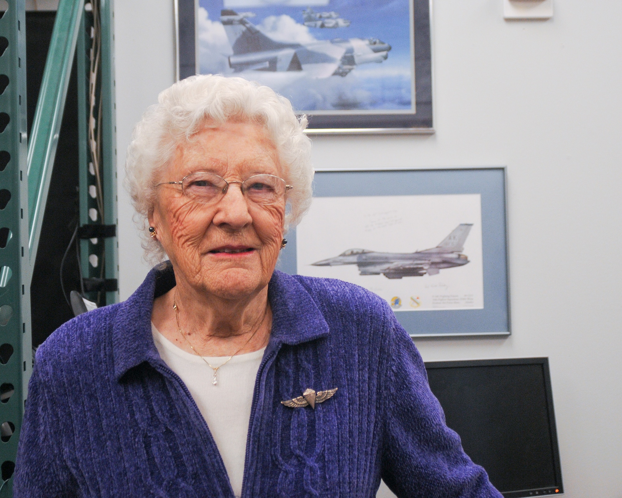 United States Marine Corps Women's Reserve Private Marjorie Flack, a
Pararigger during World War II visits a modern-day parachute shop at the
180th Fighter Wing, Ohio Air National Guard Nov. 17. Mrs. Flack spent time
with parachute technicians of the Aircrew Flight Equipment shop learning
about today's parachute rigging and packing technologies, while also taking
a trip down memory lane, explaining the differences in parachute rigging
during WWII.
