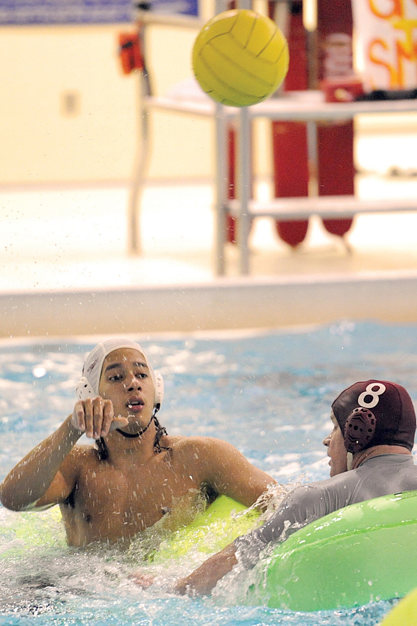 BPFC?s Tre Johnson lofts a pass over USARAK?s George Fox in the second championship game Nov. 10 at the Buckner pool.