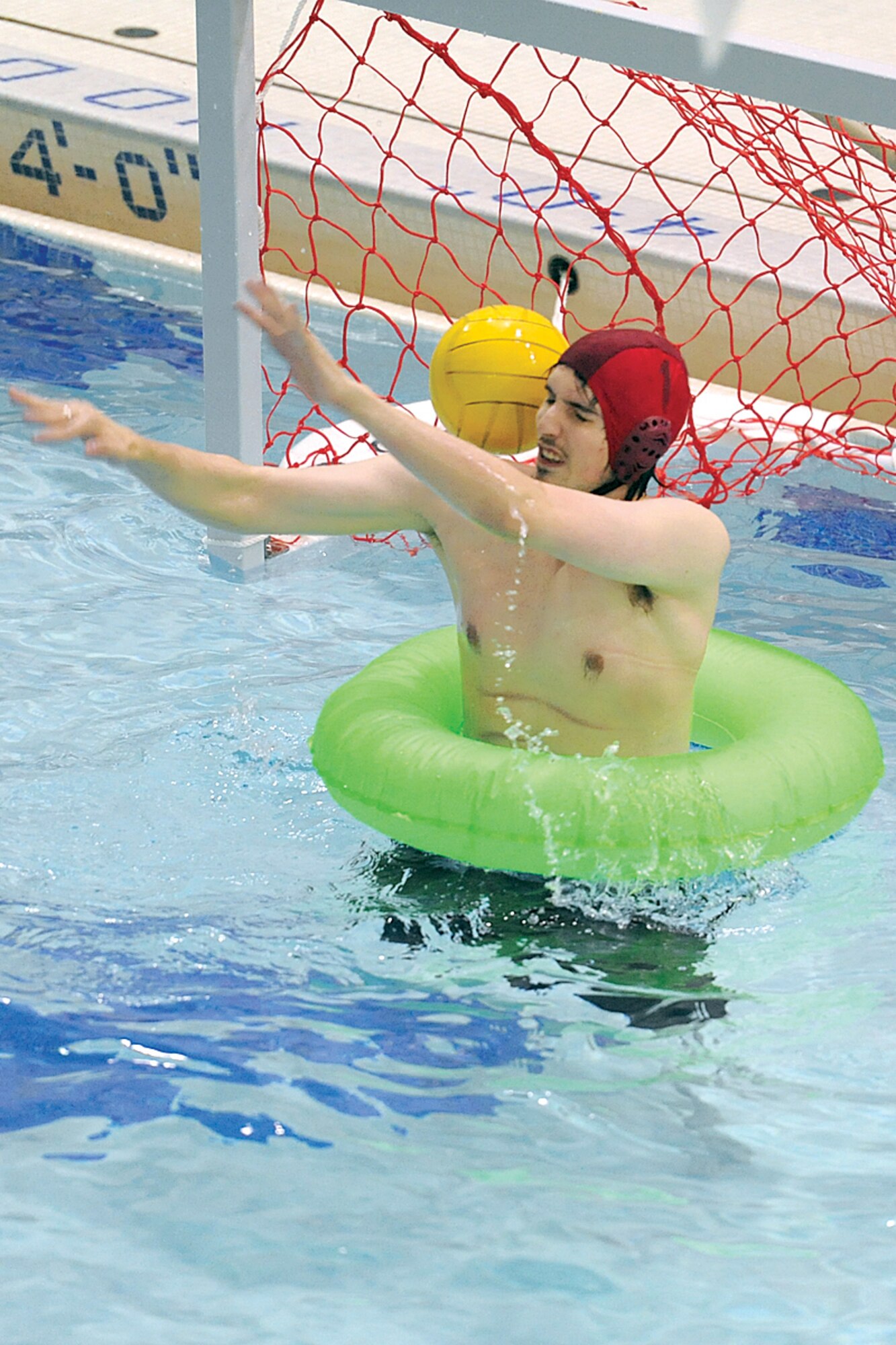 U.S. Army Alaska goalie Bradley Fratini tries to block a shot, but misses, during the second championship game Nov. 10 at the Buckner Physical Fitness Center pool. USARAK fell in consecutive games, 15-7 and 16-10, to the BPFC team.