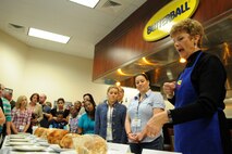 SEYMOUR JOHNSON AIR FORCE BASE, N.C. ? Butterball Talk-Line Director, Mary Clingman discusses different techniques used to bake, fry, grill, and microwave turkeys at the Butterball Headquarters in Garner, N.C., Nov. 16, 2010. Mrs. Clingman hosted the Military Spouse Butterball University with military wives and active duty members from Seymour Johnson Air Force Base and Ft. Bragg Army Post. Everyone learned how to make the perfect turkey for their family?s Thanksgiving and Christmas holidays. (U.S. Air Force photo/Senior Airman Makenzie Lang)(RELEASED)
