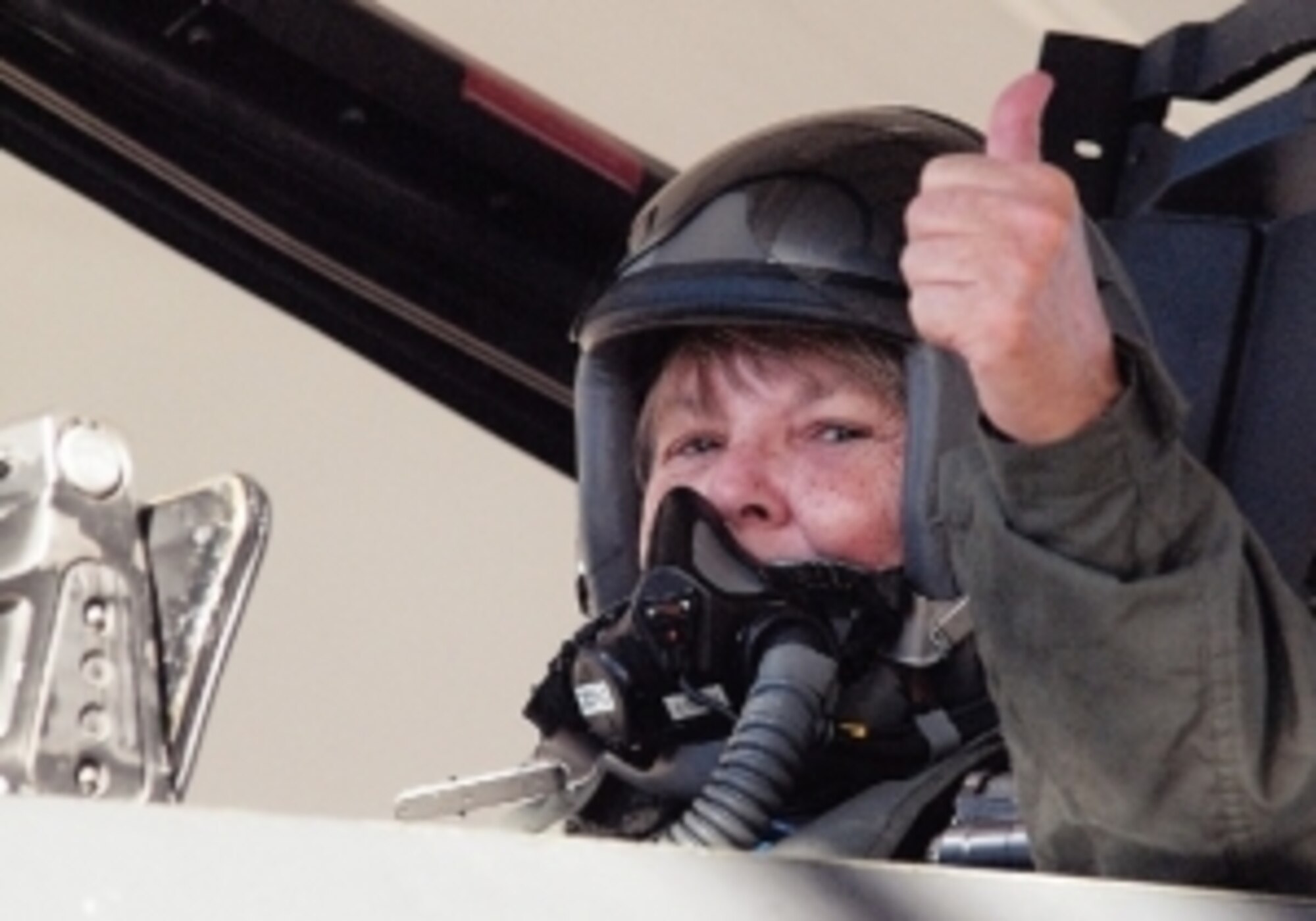 Gold Star Mother Janet Monti gives the thumbs-up before taking flight in an F-15E Strike Eagle Nov. 10, 2010, at Seymour Johnson Air Force Base, N.C. Her son, Army Staff Sgt. Jared Monti, always wanted to be a pilot, but joined the Army instead. More than four years after his heroic death in Afghanistan, his mother was given a chance to live her son's dream. (Courtesy photo/News-Argus/Michael K. Dakota)
