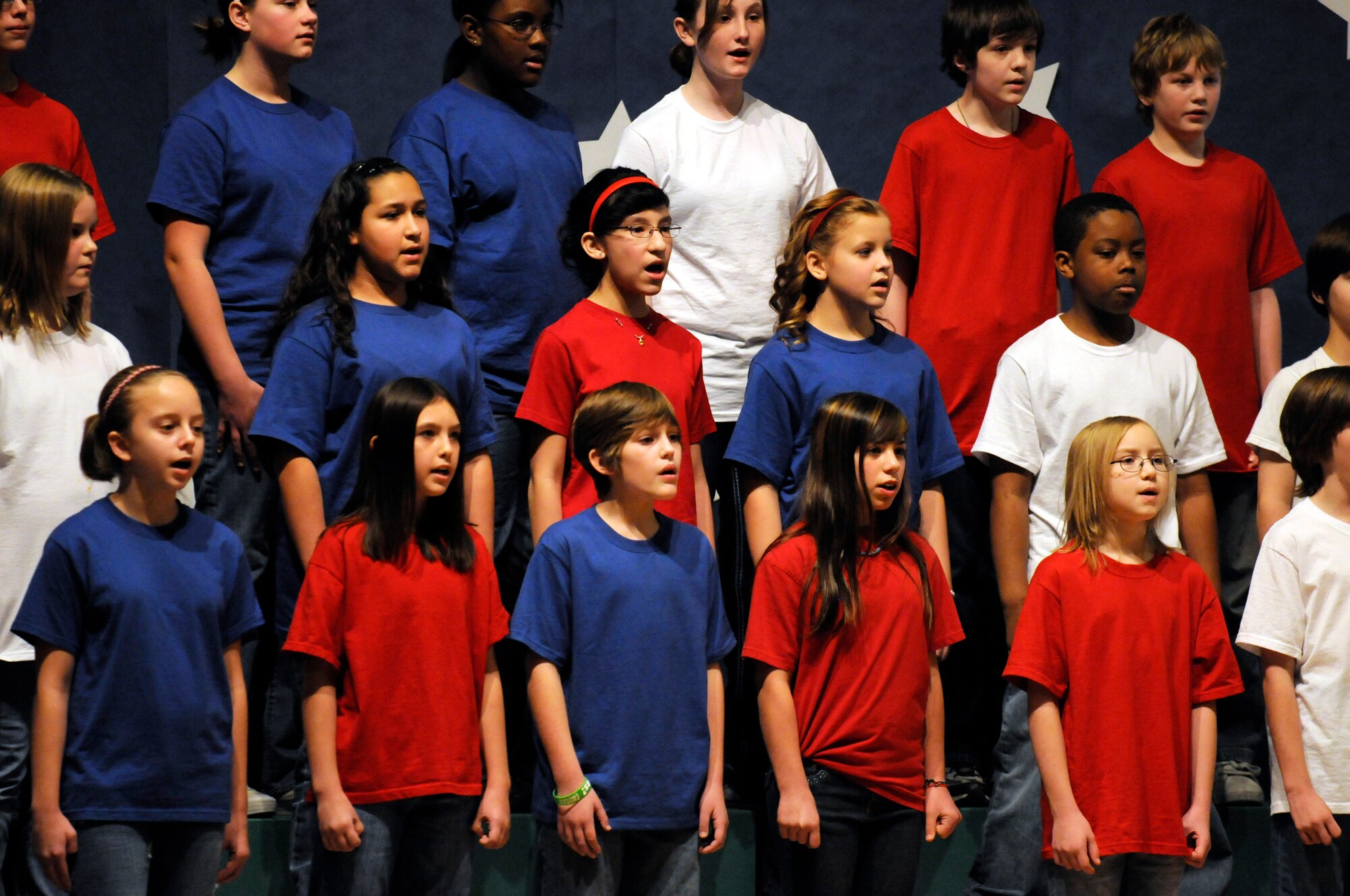 Students from Crawford Elementary School participate in a musical program that honored veterans and what they stand for Nov.11, 2010, Eielson Air Force Base, Alaska.  The program honored the military community by singing songs that highlighted the importance of the brave men and women that defend this nation.  (U.S. Air Force by/Airman 1st Class Yash Rojas)