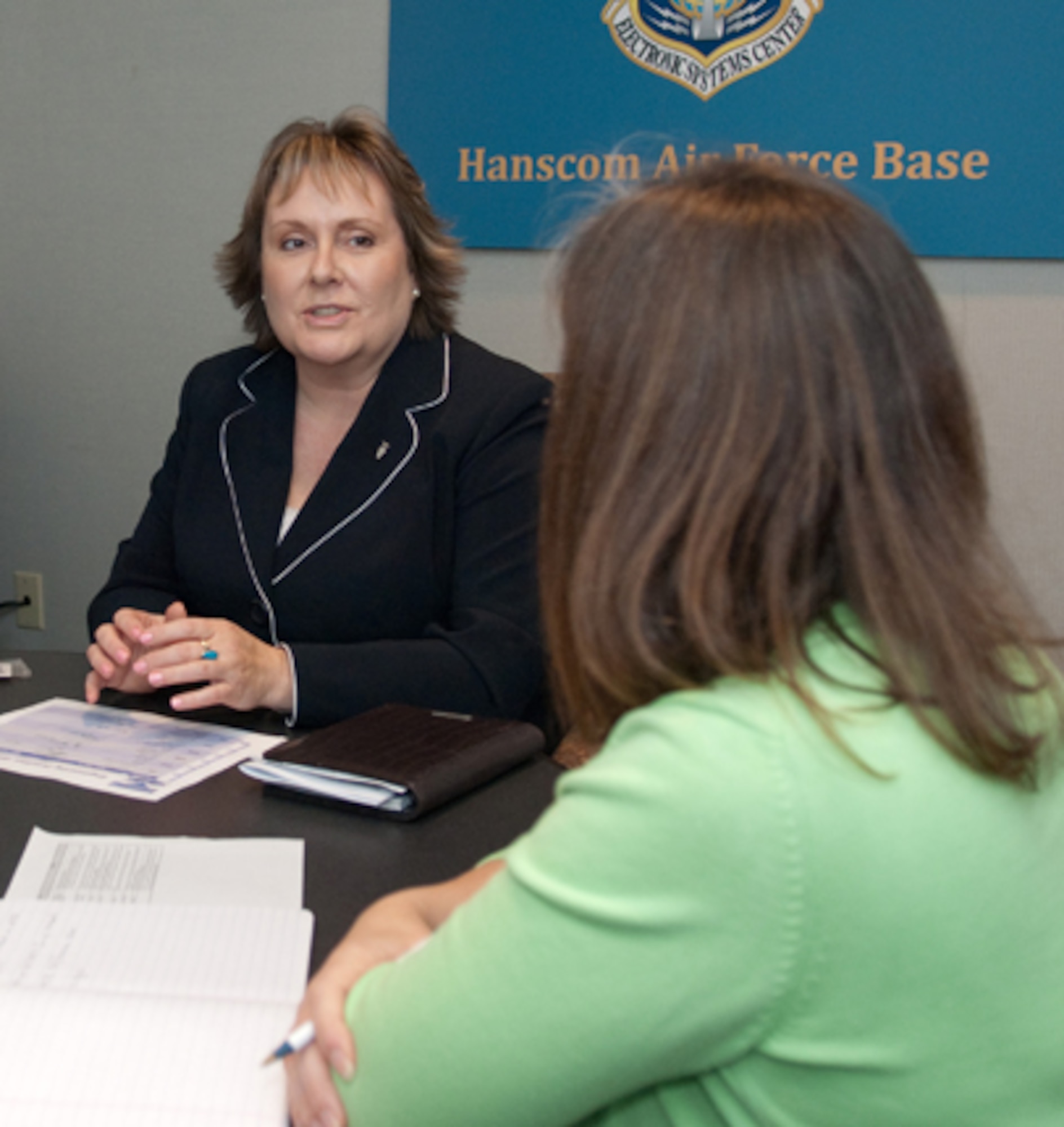 Susan Thornton, new Electronic Systems Center Engineering director, speaks to Dr. Susan Arnold, Engineering Resource Management Division chief, about plans for the organization during a Nov. 15  staff meeting. (U.S. Air Force photo by Rick Berry)

