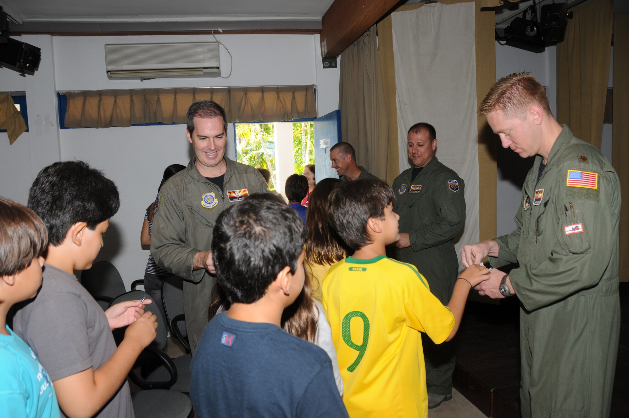 Members of the 161st Air Refueling Wing, Phoenix, Ariz., hand out coins to students from the American School of Recife on November 17, 2010, in Recife, Brazil. The 161st ARW is participating in CRUZEX V, or Cruzeiro Do Sul (Southern Cross).  CRUZEX  is a multi-national combined exercise involving the Air Forces of Argentina, Brazil, Chile, France and Uruguay, and observers from numerous other countries with more than 82 aircraft and almost 3,000 Airmen involved.



U.S. Air Force Photo by Master Sgt. Kelly Deitloff

