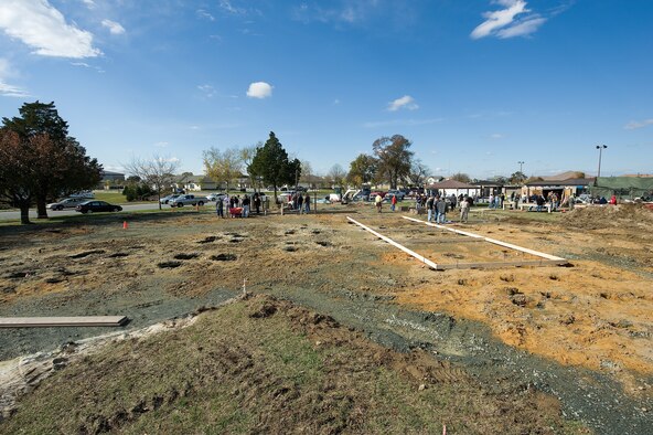 A view of the new playground being built next to the base swimming pool at Dover AFB, De., Nov. 6, 2010. Wing leadership directed a portion of funds obtained from winning the 2010 Air Mobility Command's Commander-in-Chief's Award for Installation Excellence for the park’s construction.  The playground, designed by Leathers and Associates, features swings, slides and other play areas contained inside a huge shell resembling a large cargo military aircraft. It could be a C-17 or a C-5, depending on how you look at it. The park is being built by more than 900 base volunteers. (U.S. Air Force Photo/Jason Minto)