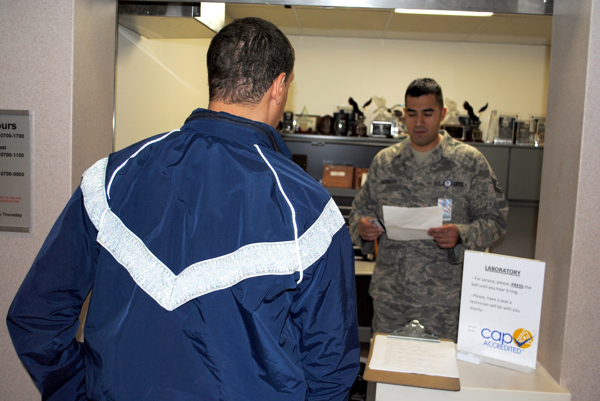 Tech. Sgt. Nicanor Barboza, 341st Medical Group clinical laboratory NCOIC, begins processing for a patient who is due for some blood work at the laboratory Nov . 16. Having been accredited by the College of American Pathologists, the lab is able to provide testing for detection, diagnostic and treatment purposes on the installation. (U.S. Air Force photo/Airman 1st Class Kristina Overton)