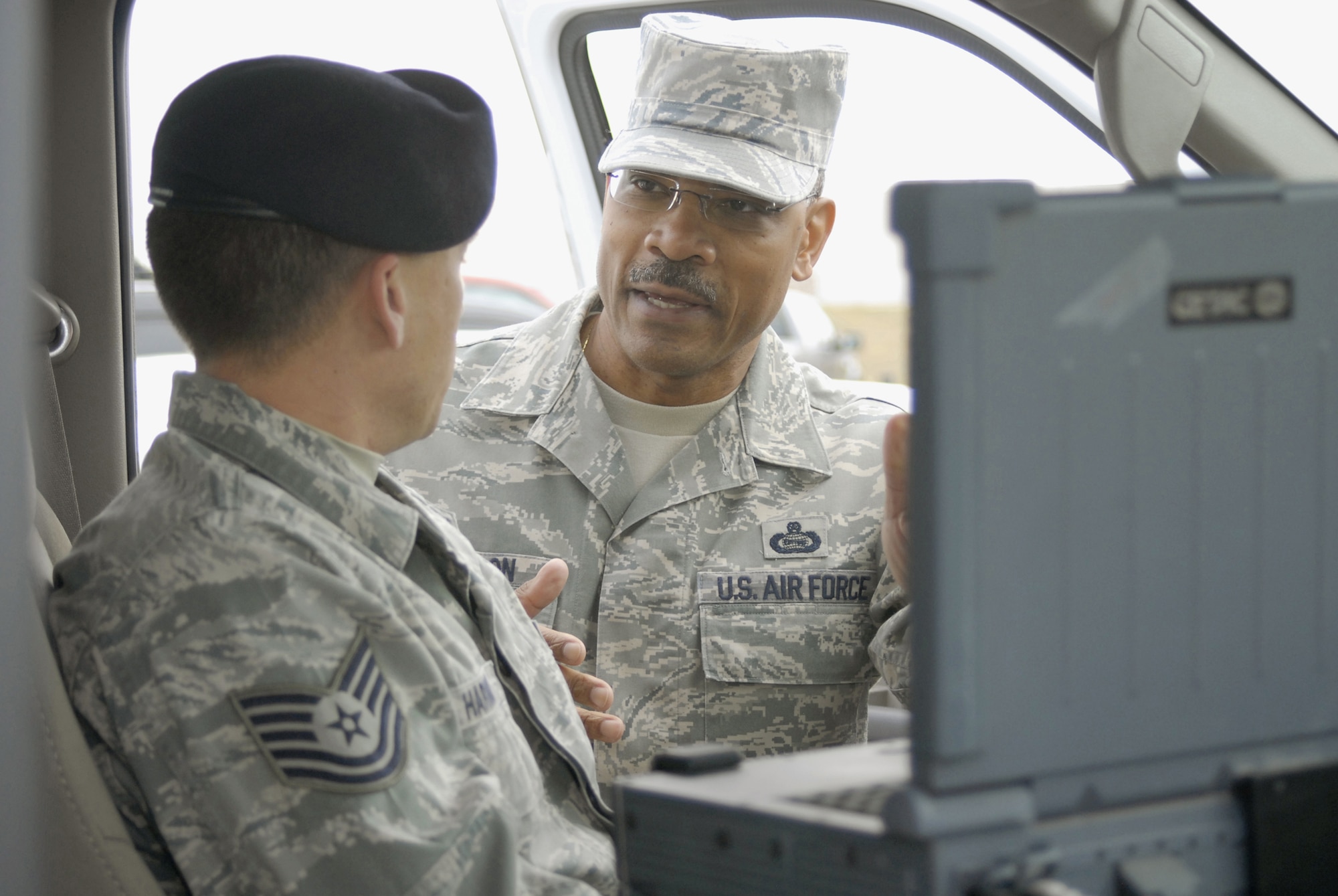 Tech. Sgt. Robert Harmon, 341st Security Forces Squadron NCOIC of police services, demonstrates the capabilities of the Z Backscatter Van to Chief Master Sgt. Jack Johnson, Air Force Global Strike Command command chief master sergeant, Nov. 10. (U.S. Air Force photo/ Beau Wade)