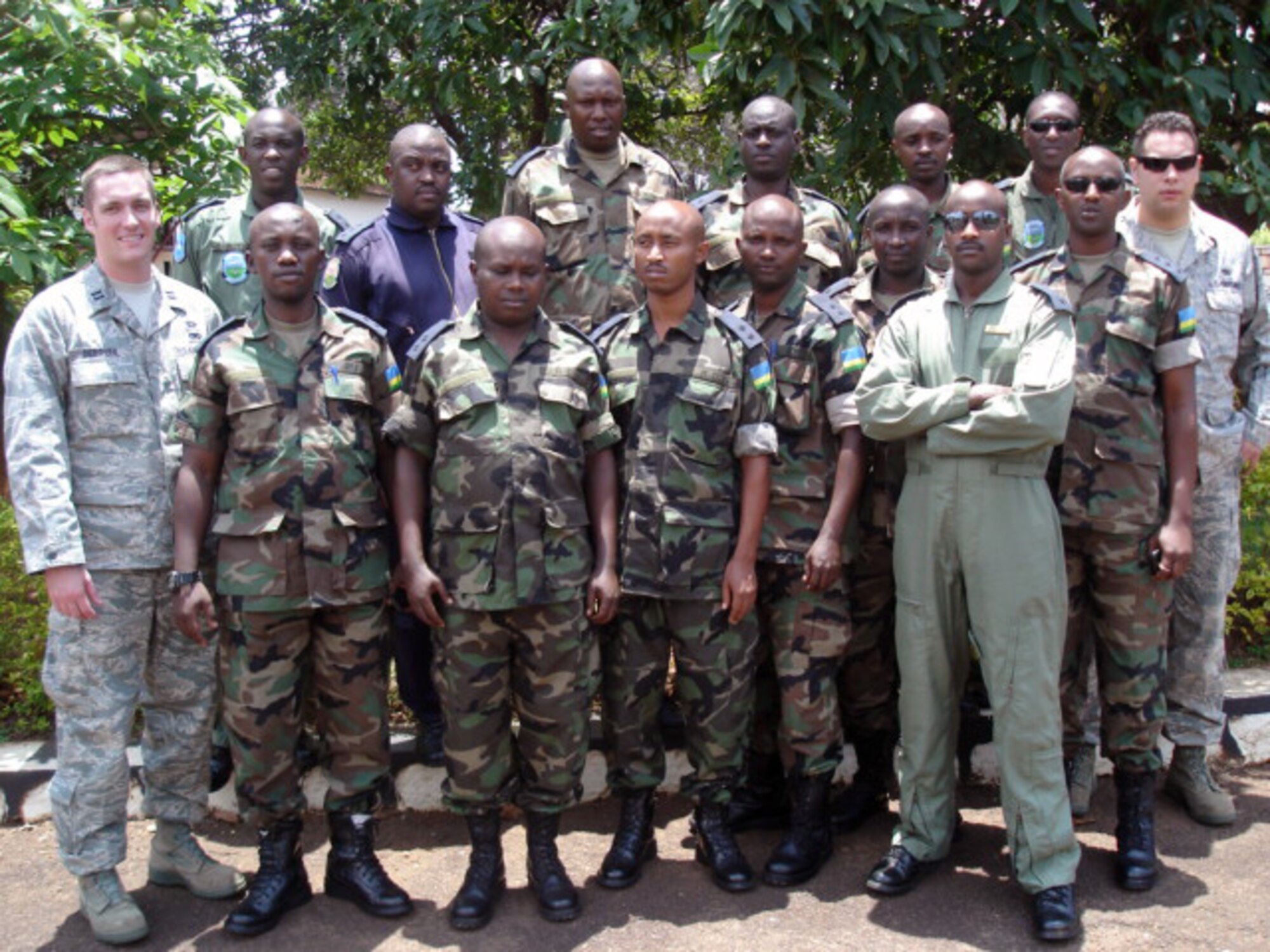 Capt. Brian DeBruhl (far left), commander of the 373rd Training Squadron's Detachment 4 at Little Rock Air Force Base, Ark., and Tech. Sgt. Brandon Macken (far right, second row), an instructor at the detachment, pose for a photo with officers from the Rwanda air force in mid-September. The pair traveled to Rwanda to help train the officers in aircraft maintenance and logistics and conduct a maintenance management training course. The detachment is part of the 982nd Training Group based at Sheppard Air Force Base. (Photo courtesy of Capt. Brian DeBruhl)