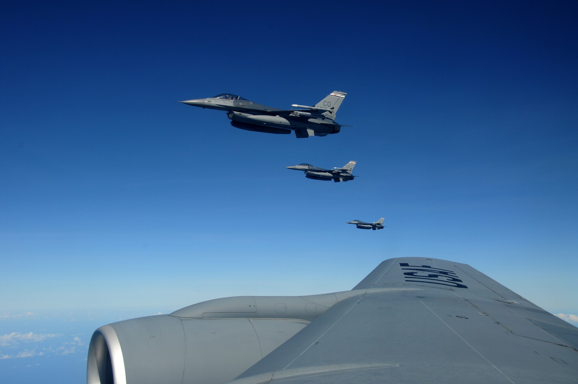 Three F-16 Fighting Falcons from the 140th Fighter Wing, Buckley, Colo., maintain their position as they wait for the last aircraft of their four-ship formation to refuel during CRUZEX November 15, 2010. The 140th Fighter Wing is participating in CRUZEX V, or Cruzeiro Do Sul (Southern Cross).  CRUZEX  is a multi-national combined exercise involving the Air Forces of Argentina, Brazil, Chile, France and Uruguay, and observers from numerous other countries with more than 82 aircraft and almost 3,000 Airmen involved. U.S. Air Force Photo by Master Sgt. Kelly Deitloff