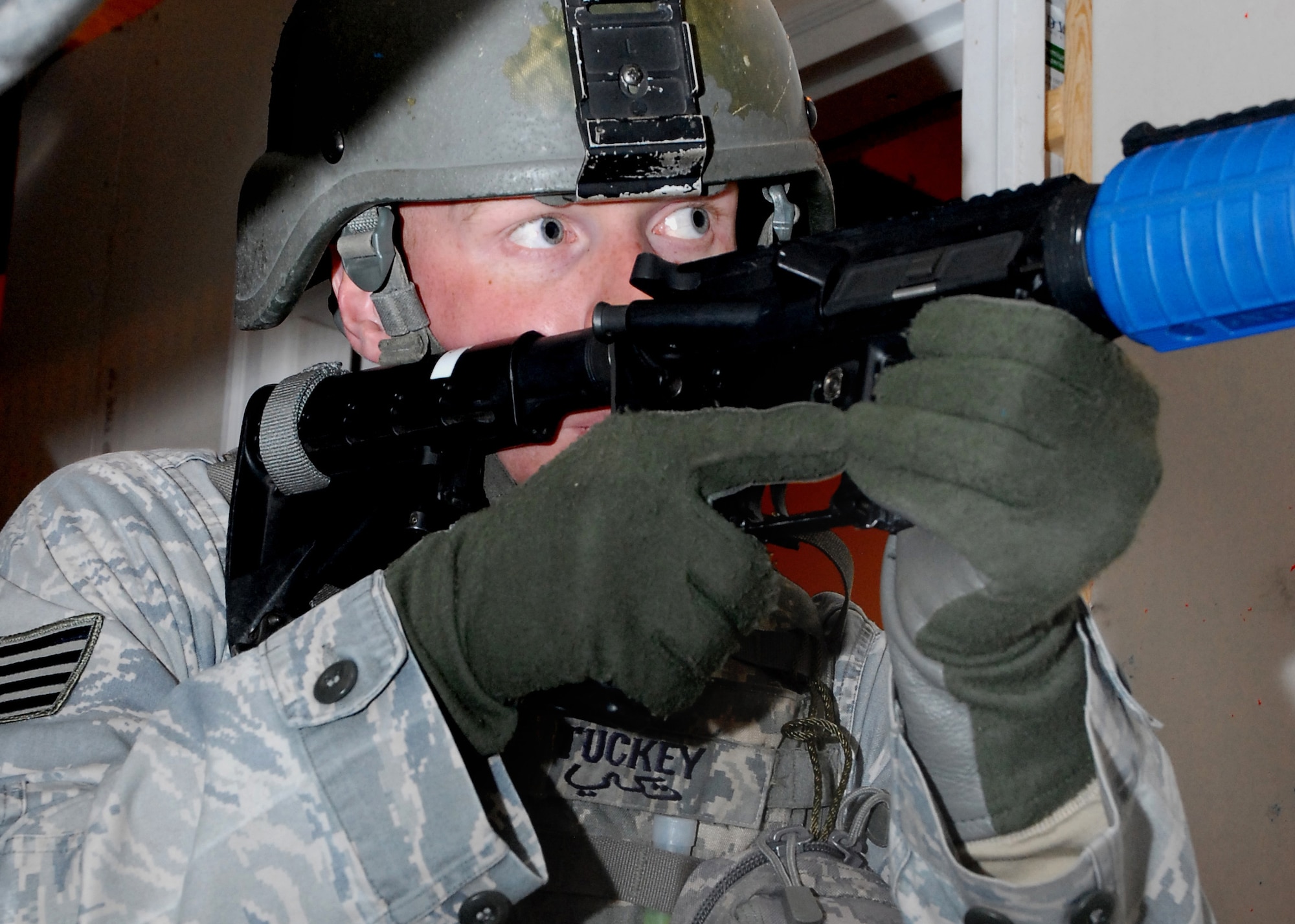 Staff Sgt. Jeffrey Tuckey, 741st Missile Security Forces Squadron convoy response force leader, scans for threats during a room-clearing exercise Oct. 29 in the "Shoot House." Sergeant Tuckey is among the Defenders who were hand-picked to represent Malmstrom during the 2010 Global Strike Challenge competition. (U.S. Air Force photo/Staff Sgt. Dillon White)
