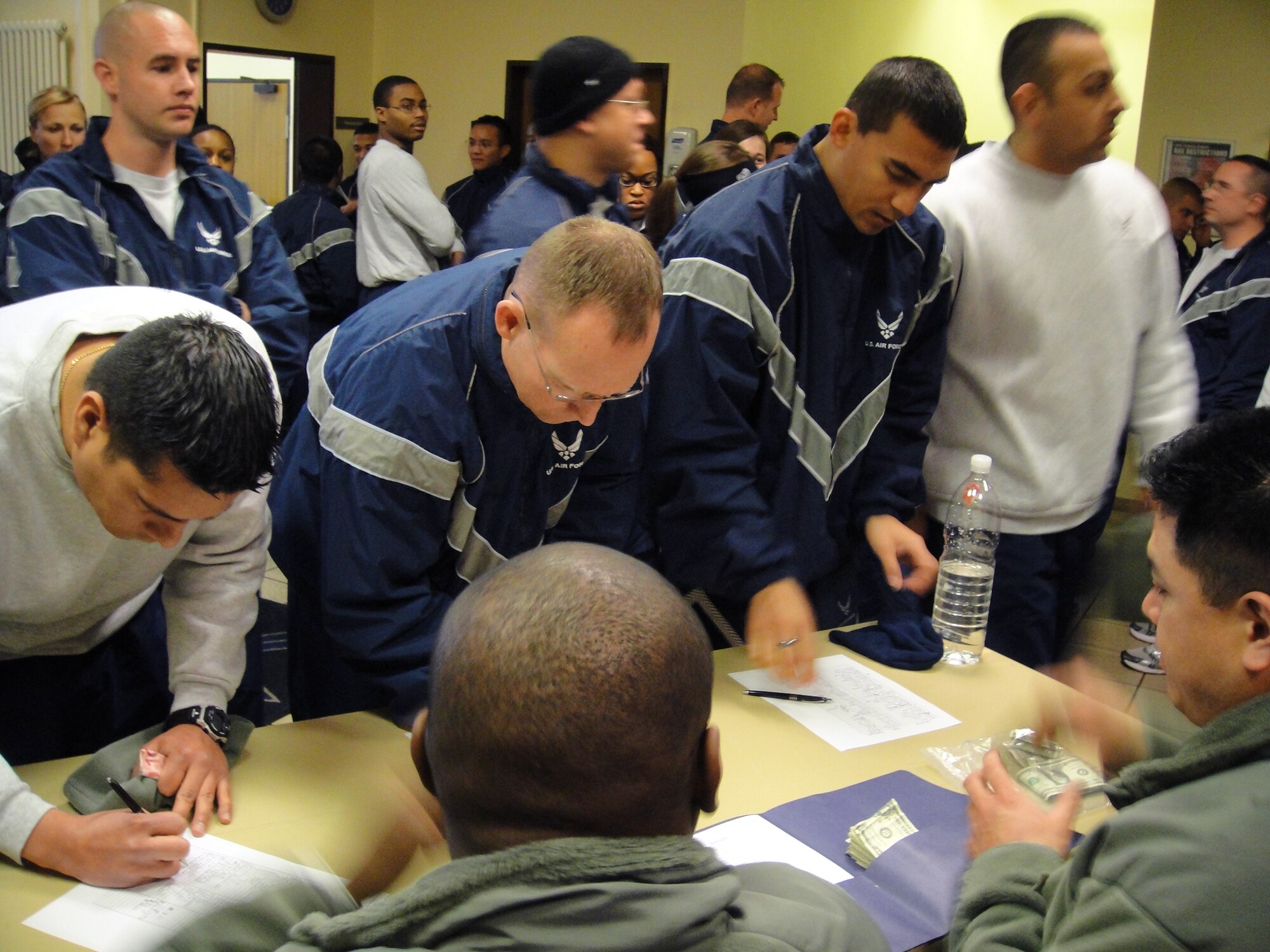 SPANGDAHLEM AIR BASE, Germany – Participants sign up for a five-kilometer charity run Nov. 9 to benefit the Landstuhl Fisher House. More than 250 people helped the event raise more than $3,500 to donate to the house through the Combined Federal Campaign. (U.S. Air Force photo)