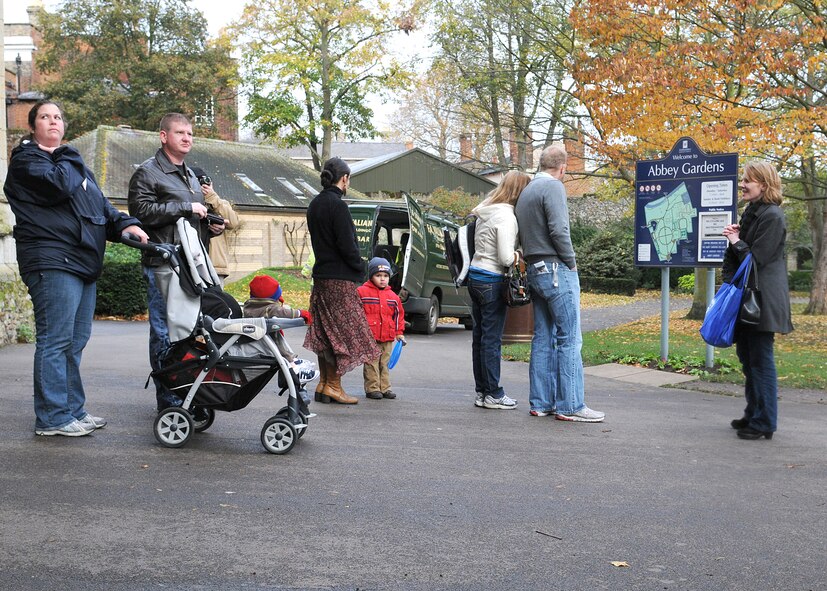 RAF MILDENHALL, England -- Jennifer Johnson, Airman and Family Readiness Center community readiness consultant (right), introduces RAF Mildenhall newcomers to the Abbey Gardens during the Newcomer's Bury Bus Tour in Bury St. Edmunds Nov. 11, 2010.  This tour is offered by the A&FRC to introduce newly-arrived personnel to the local area.  (U.S. Air Force photo/Senior Airman Tabitha M. Lee)
