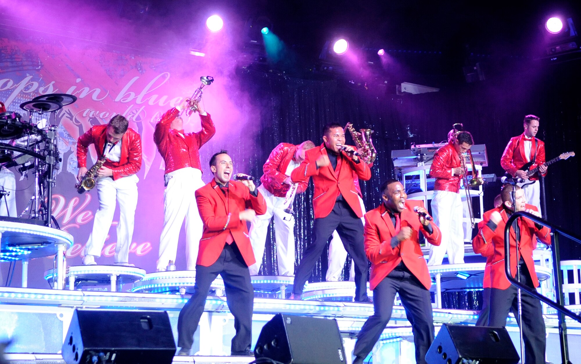 HAMPTON, Va. -- Tops in Blue vocalists perform for military members and their families during the 2010 We Believe tour at the Hampton University Convocation Center Nov. 12. Tops in Blue, made up of active-duty Airmen from all over the Air Force, entertained more than 2,000 people who came out to the free performance where the group performed 25 songs from a variety of genres to include R&B and rock ‘n’ roll. (U.S. Air Force photo/Staff Sgt. Dana D. Hill)(RELEASED)