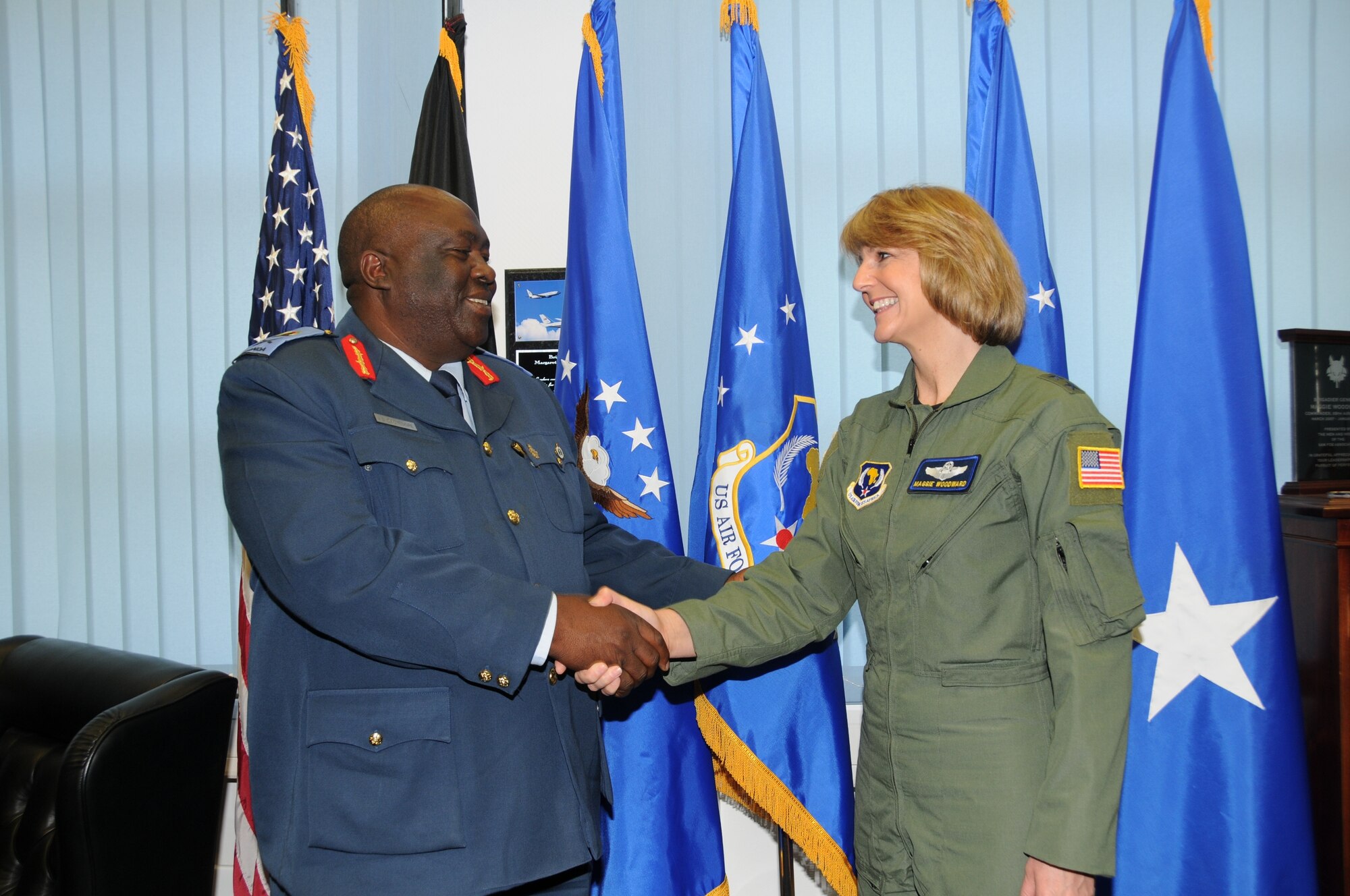 Maj. Gen. Margaret Woodward (left), Commander of 17th Air Force (Air Forces Africa) thanks Ugandan People’s Defence Air Force Chief Maj. Gen. Jim Owoyesigire for his visit to 17th Air Force (Air Forces Africa) and Team Ramstein Nov. 10. The Ugandan Airmen’s visit, which also included the 86th Airlift and 435th Air Ground Operations Wings in addition to the 52nd Fighter Wing at Spangdahlem Air Base, focused on cooperation between the UPDAF and 17th AF, the air component for U.S. Africa Command. (USAF photo by Maj. Paula Kurtz) 