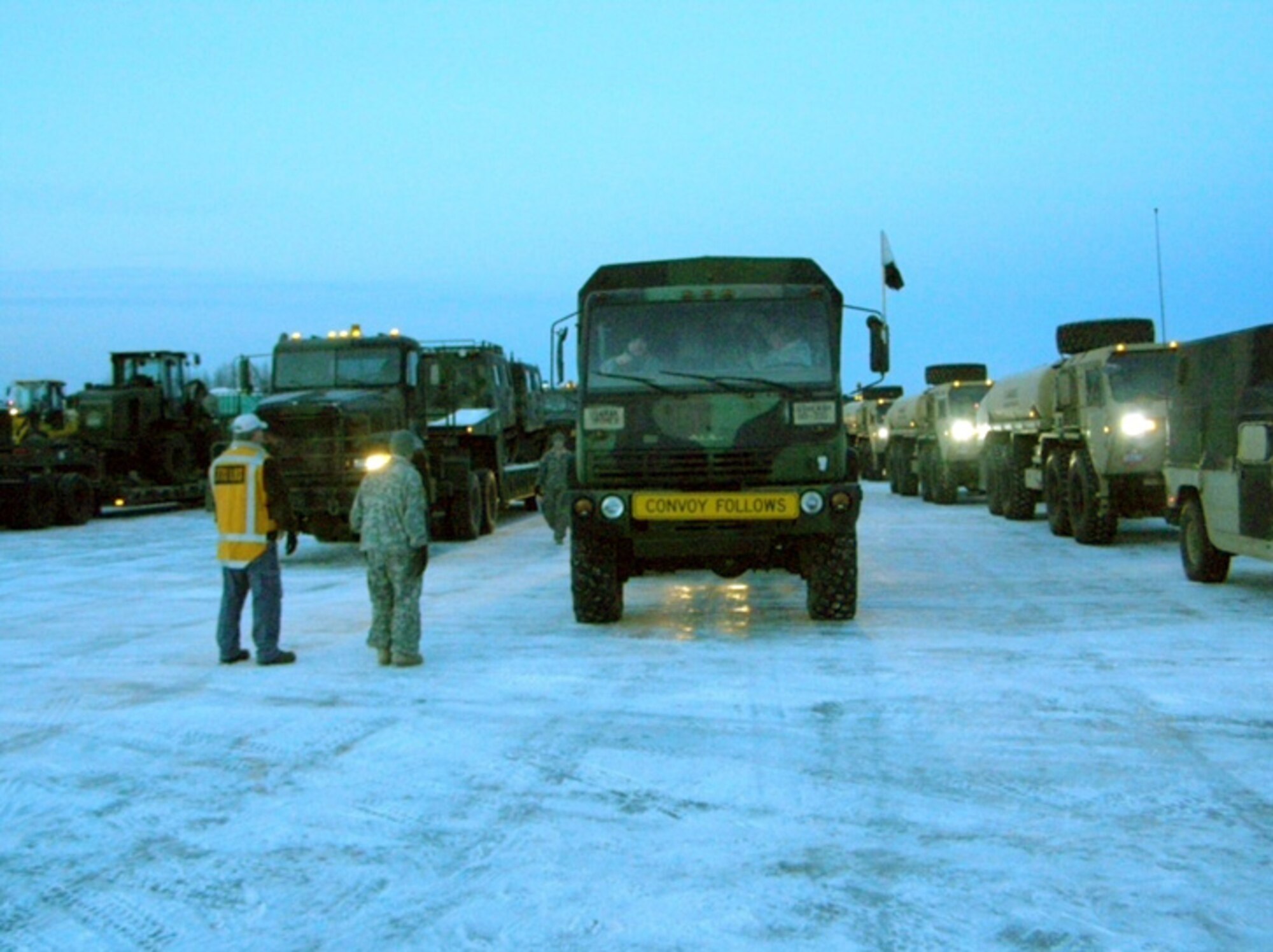F-22 Aircraft Recovery Operation Ground Support, 18 November 2010, JOINT BASE ELMENDORF-RICHARDSON, Alaska.  Army convoy ready to move.  (U.S. Air Force courtesy photo)

