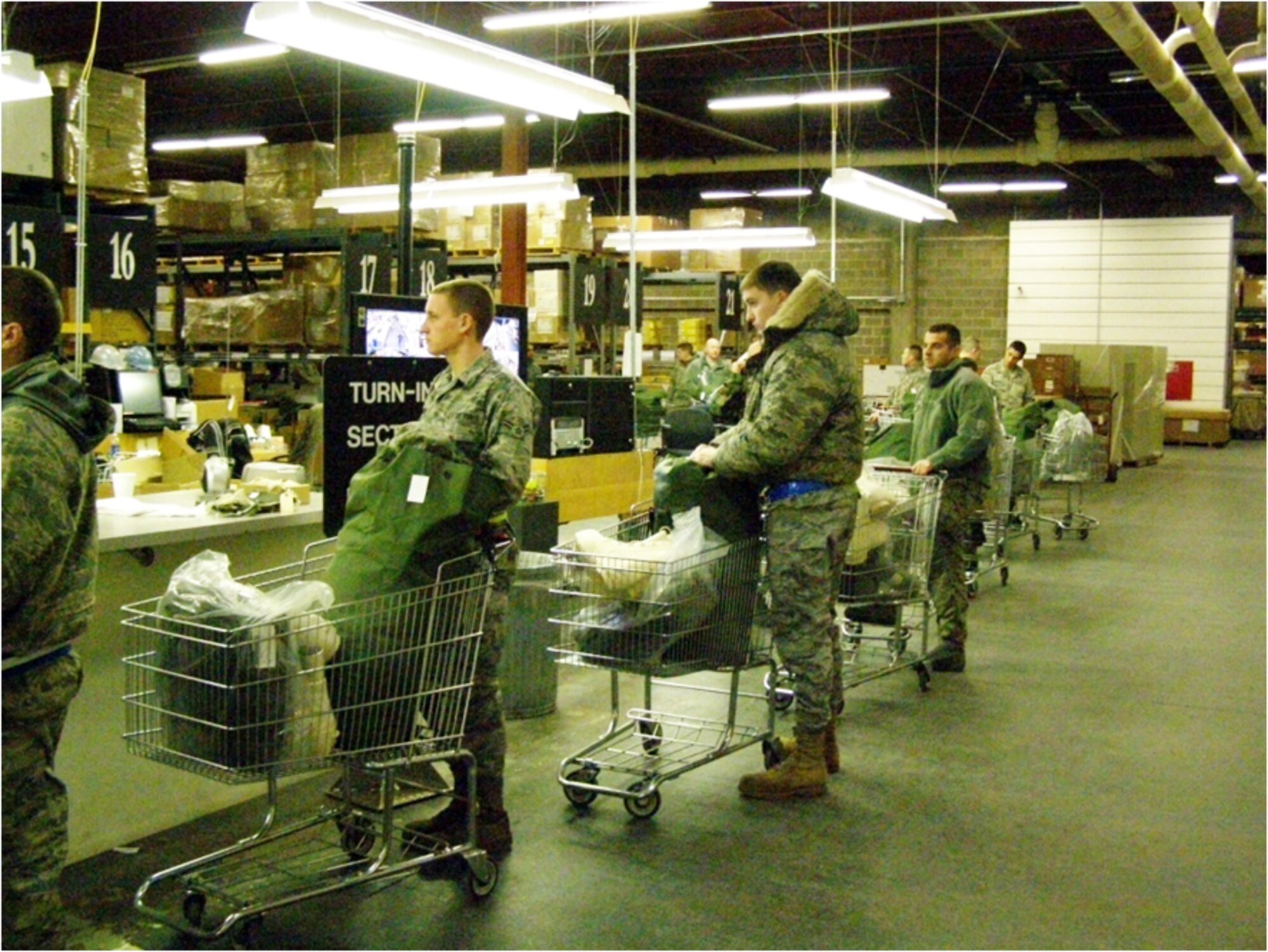 F-22 Aircraft Recovery Operation Ground Support, 18 November 2010, JOINT BASE ELMENDORF-RICHARDSON, Alaska. 0ne hour prior to convoy movement Air Force
 team issued cold weather equipment from  773rd LRS Central Issue Facility (CIF) (U.S. Air Force courtesy photo)
