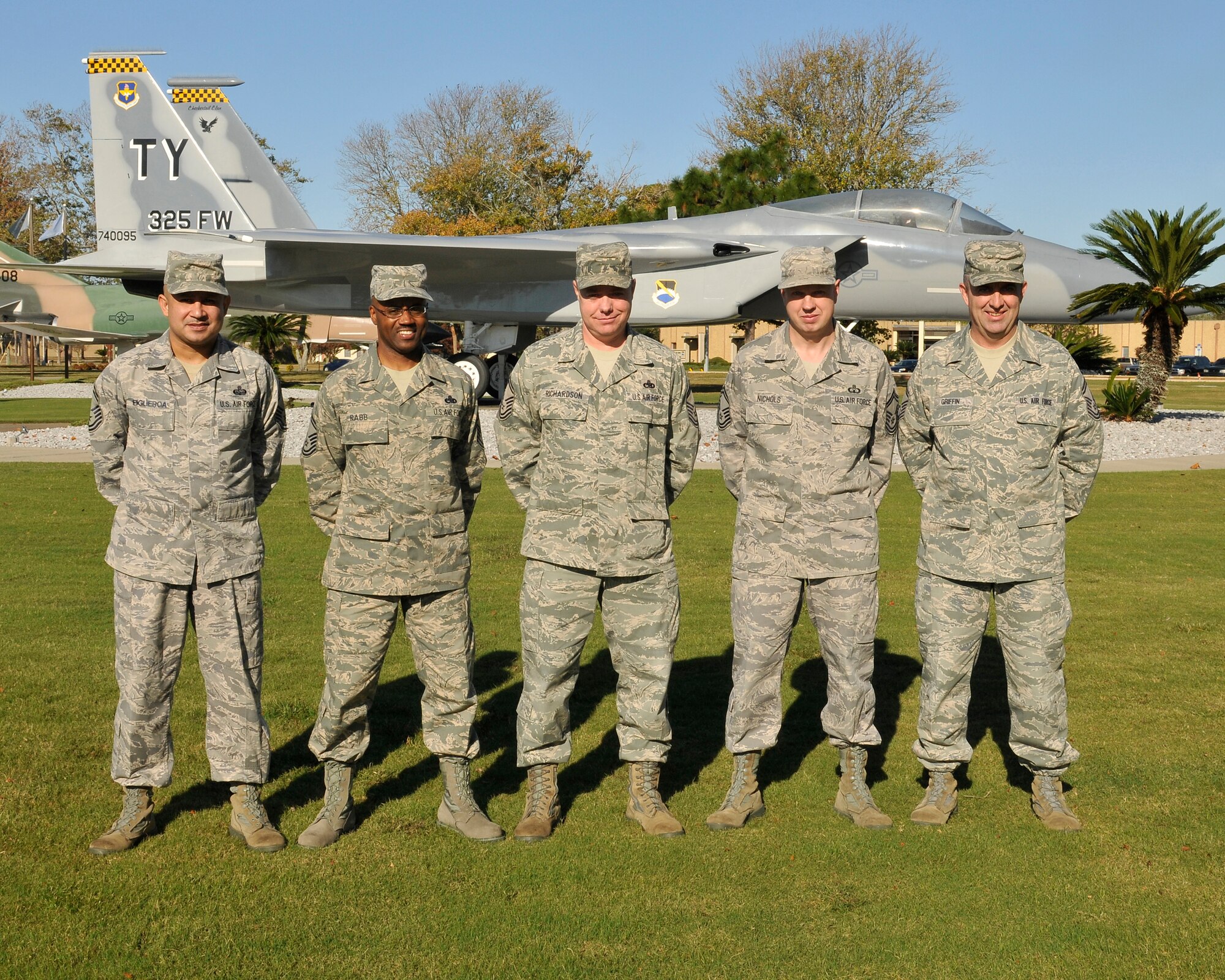The Air Force announced today five Tyndall Airmen selected to promote to Chief Master Sergeant. The photo to the right pictures Senior Master Sergeants selected for promotion, from left to right,  Paul Figueroa, 325th Communications Squadron Cyber Operations superintendent; Michael Rabb, 325th Aircraft Maintenance Squadron assistant superintendent; Donald Richardson, 325th Maintenance Group quality assurance superintendent; Charles Nichols, Radar Approach Control chief controller; and Timothy Griffin, 325th CS plans and resources flight chief.   “I look forward to bringing someone else with me,” said Sergeant Rabb. “For instance, if you are promoted to Master Sergeant it is your job to help the Staff Sergeants fill in your Technical Sergeant slot.” Sergeant Rabb was not the only chief selectee enthusiastic for the future. “I am looking forward to continuing to make positive change for the Air Force, just on a bigger scale,” said Sergeant Griffin.
