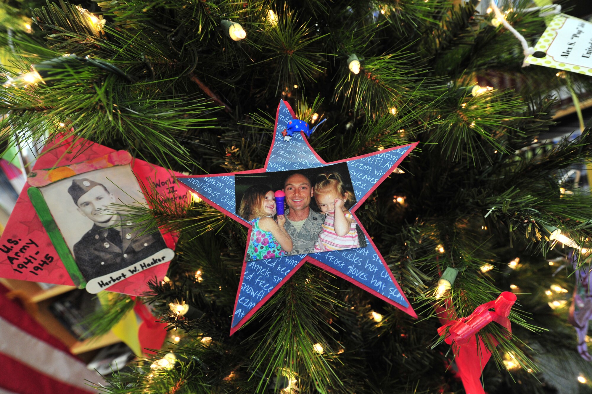 A handmade ornament on a Heroes' Tree at the base library, Nov. 14, 2010. Our Heroes' Tree is a community outreach program co-founded in 2005 by Stephanie Pickup, author of The Soldiers' Tree, and Marlene Lee, author of The Hero in My Pocket. This program promotes awareness of the service and sacrifice of U.S. service members and their families. (U.S. Air Force photo by Tech Sgt. Josef Cole)(RELEASED) 