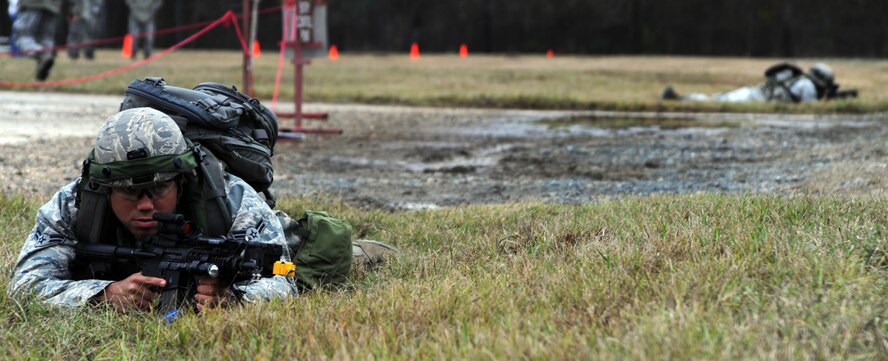 Airmen from the 28th Security Forces Squadron from Ellsworth Air Force Base, S.D., guard a restricted area during the tactics portion of the Global Strike Challenge at Camp Minden, La., Nov. 13. The competition includes security forces along with missile and bomber forces from Air Force Global Strike Command. Teams have the opportunity to participate in innovative thinking, teamwork and esprit de corps. (U.S. Air Force photo/Senior Airman Brittany Y. Bateman)(RELEASED)