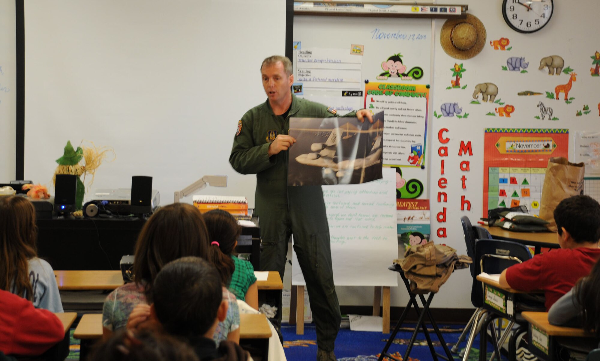 Tampa, Fla. -- Master Sgt. Johnny Pullen, a boom operator with the 927th Air Refueling Wing, visited four classrooms at Crestwood Elementary as part of a Teach-In.  Pullen taught students about  the value of science and math as he described his aerial refueling missions, demonstrated life support systems of the aircraft he flies in, and answered questions about life in the military. The students and faculty of schools throughout the Tampa area invited servicemembers and other professionals to their schools to present their jobs to students recently as part of the Teach-In.  (Official Air Force photo by Staff Sgt. Shawn Rhodes)