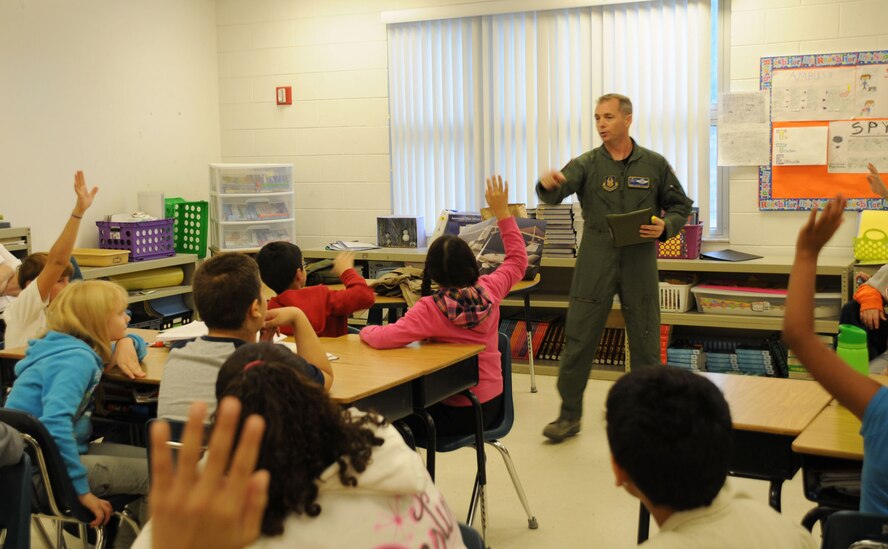 Tampa, Fla. -- The students and faculty of schools throughout the Tampa area invited servicemembers and other professionals to their schools to present their jobs to students recently.  Master Sgt. Johnny Pullen, a boom operator with the 927th Air Refueling Wing, visited four classrooms at Crestwood Elementary.  Students learned about the value of science and math as Pullen described his aerial refueling missions, demonstrated life support systems of the aircraft he flies in, and answered questions about life in the military. (Official Air Force photo by Staff Sgt. Shawn Rhodes)