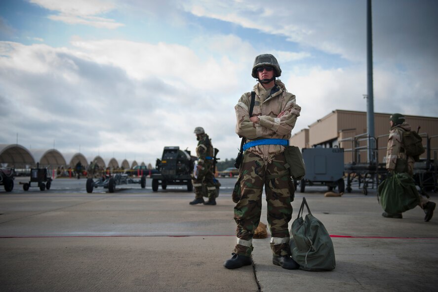 MOODY AIR FORCE BASE, Ga. -- Airman Ryan Countryman, 23rd Civil Engineer Squadron emergency management apprentice, waits for a transport bus during the first day of a Phase II Operational Readiness Exercise Nov. 16. Airman Countryman was part of a reconnaissance team which checked for hazards after attacks. He arrived to Moody in early June, and this was his first time participating in a base-wide exercise. (U.S. Air Force photo/Senior Airman Jamal D. Sutter)(RELEASED)