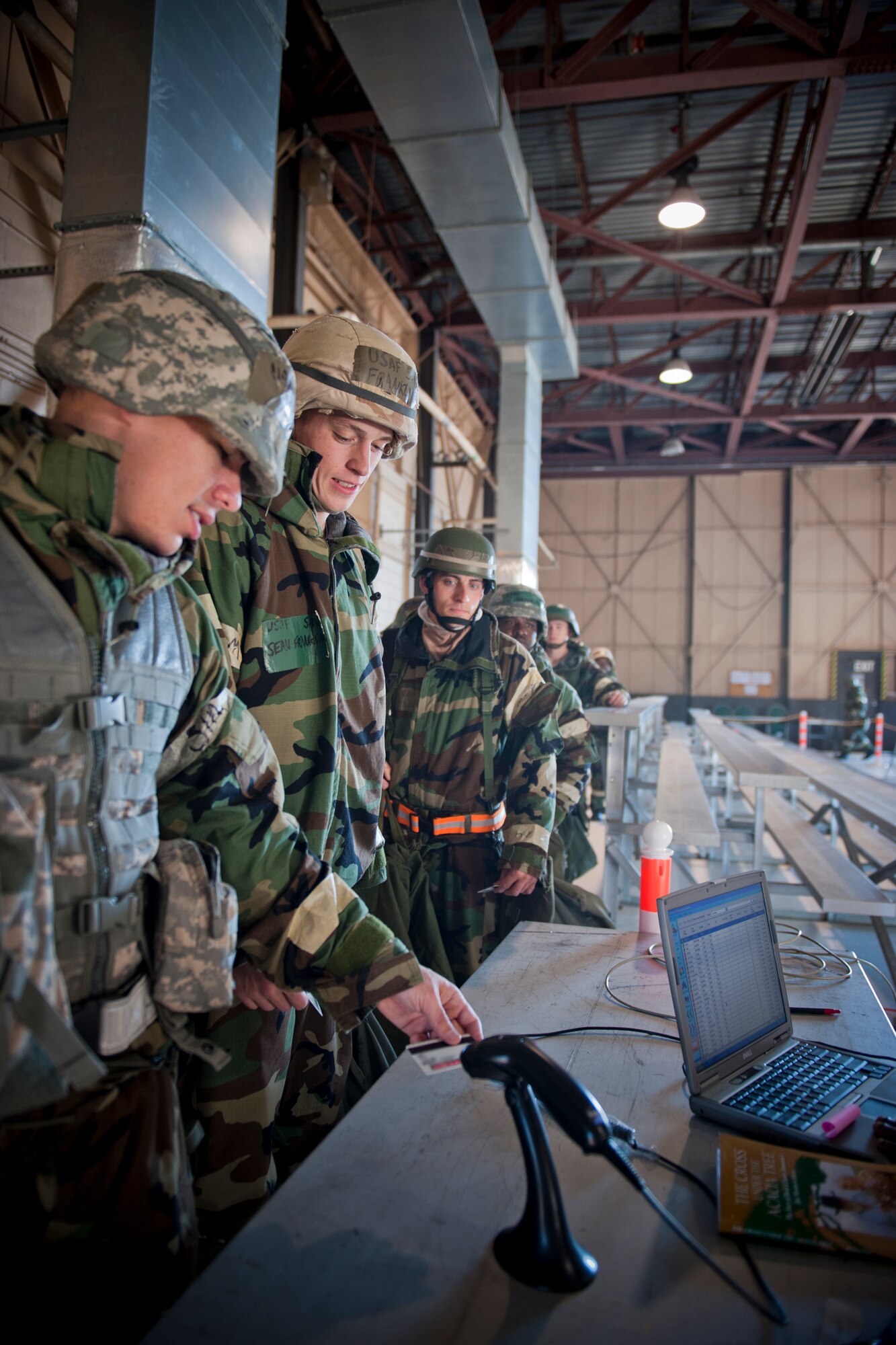 MOODY AIR FORCE BASE, Ga. -- Participants in a Phase II Operational Readiness Exercise sign out at an exercise entry point after completing their shift Nov. 17. The exercise entry point maintained personnel accountability and provided up-to-date exercise information to Airmen coming on duty. (U.S. Air Force photo/Senior Airman Jamal D. Sutter)(RELEASED)