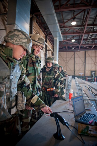 MOODY AIR FORCE BASE, Ga. -- Participants in a Phase II Operational Readiness Exercise sign out at an exercise entry point after completing their shift Nov. 17. The exercise entry point maintained personnel accountability and provided up-to-date exercise information to Airmen coming on duty. (U.S. Air Force photo/Senior Airman Jamal D. Sutter)(RELEASED)