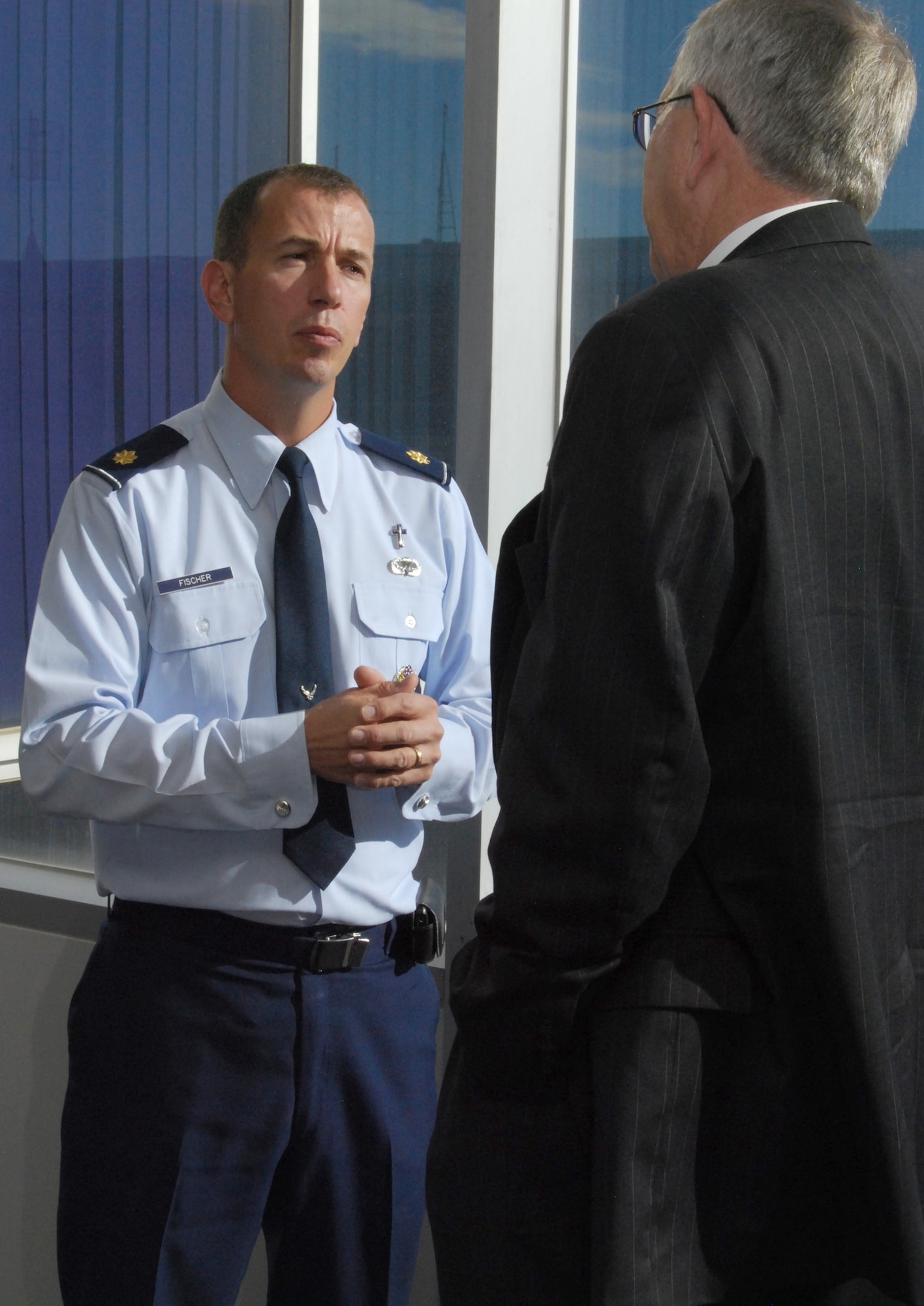 Chaplain (Maj.) Peter Fischer and the Right Reverend James Magness talk during a break at the Religious Respect Conference Nov. 16, 2010, at the Air Force Academy, Colo. Topics at the conference included balancing freedom of religious expression with the Constitution's prohibition against establishing or endorsing religion. Chaplain Fischer is the Academy's senior protestant chaplain. Reverend Magness is the bishop suffragan for federal ministries for the Office of Federal Ministries of the Episcopal Church. (U.S. Air Force photo/Staff Sgt. Don Branum)