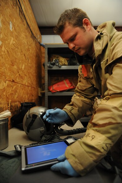DYESS AIR FORCE BASE, Texas—Senior Airman Joshua Gaffney, 7th Operations Support Squadron, checks aircrew equipment Nov. 15 during an Operational Readiness Exercise here. OREs are conducted to test the capabilities and efficiencies of Airmen to ensure they are prepared for real world events. (U.S Air Force photo/ Airman 1st Class Shannon Hall)  