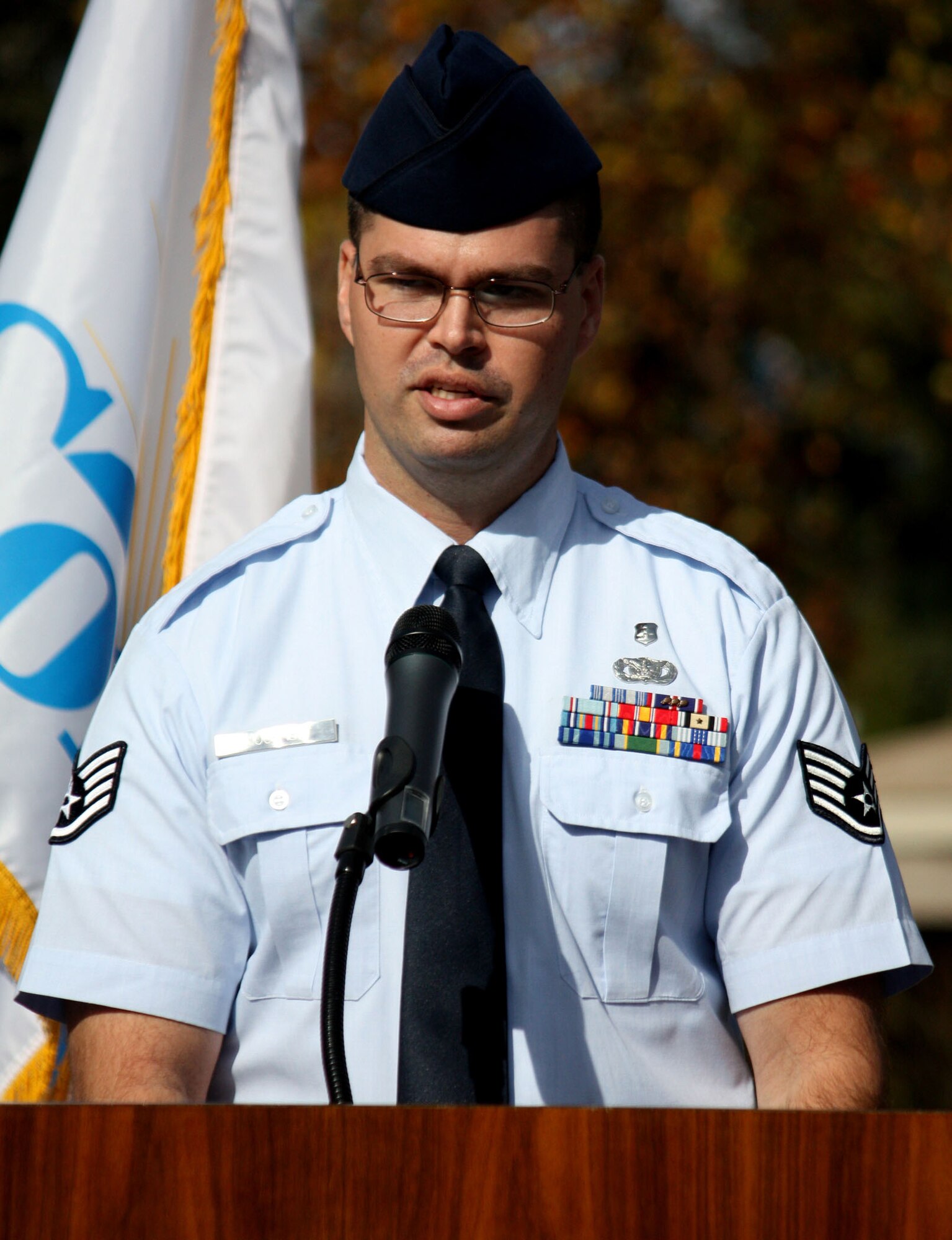 TRAVIS AIR FORCE BASE, Calif. -- Staff Sergeant Jason Knockeart, 349th Aeromedical Staging Squadron, speaks on behalf of the Air Force during a Veterans Day ceremony honoring Korean War veterans at the Hillcrest Community Park in Concord, Calif. on November 11, 2010. (U.S. Air Force photo/Senior Airman Amelia Leonard) 