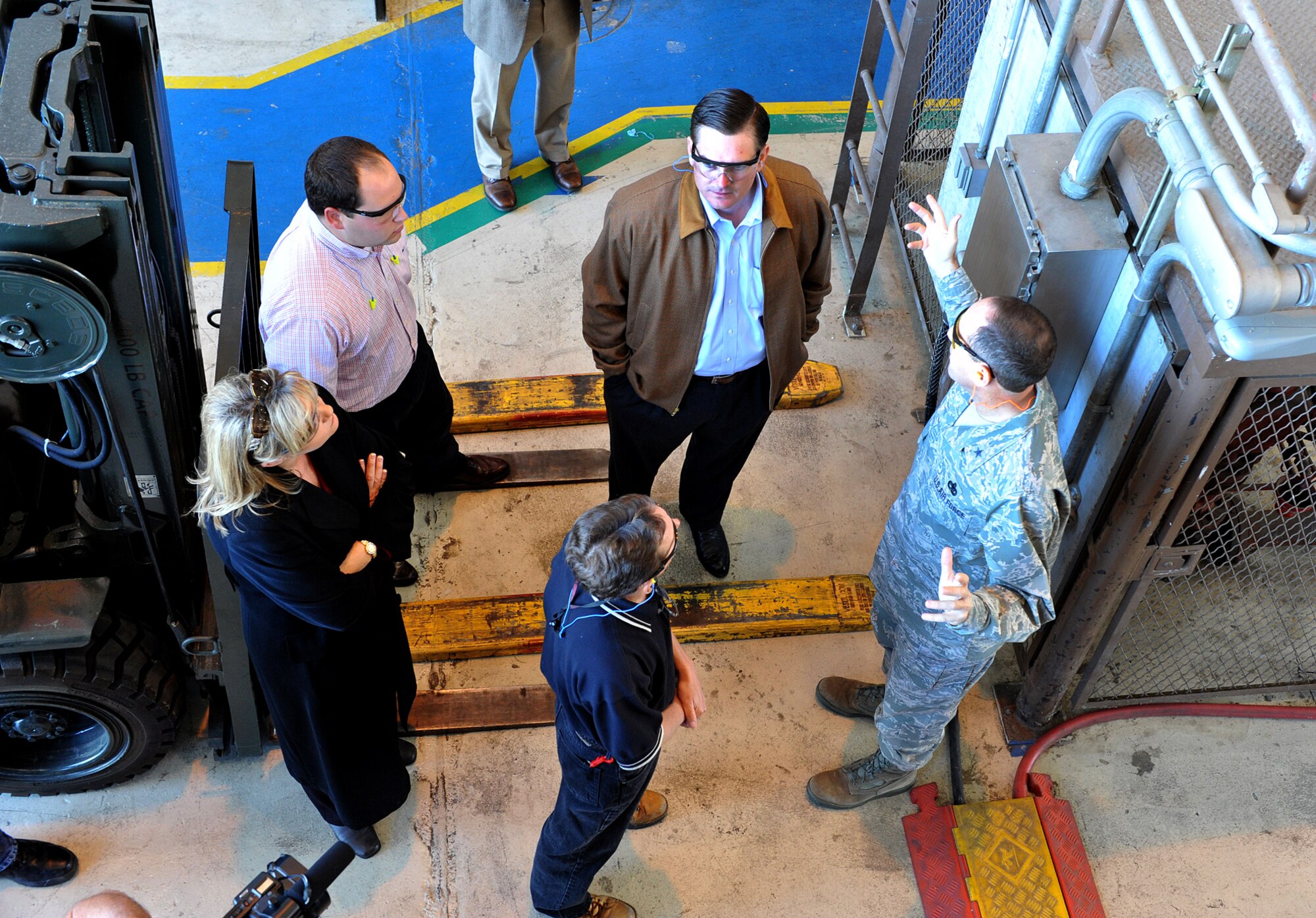 Congressman-elect Austin Scott, center, gets a tour of Maintenance areas from Brig. Gen. Lee Levy, 402nd Maintenance Wing commander, during his first in-depth visit to Robins Nov. 9. The 8th Congressional District's new representative also met with other base leaders. U. S. Ai rForce photo by Tommie Horton