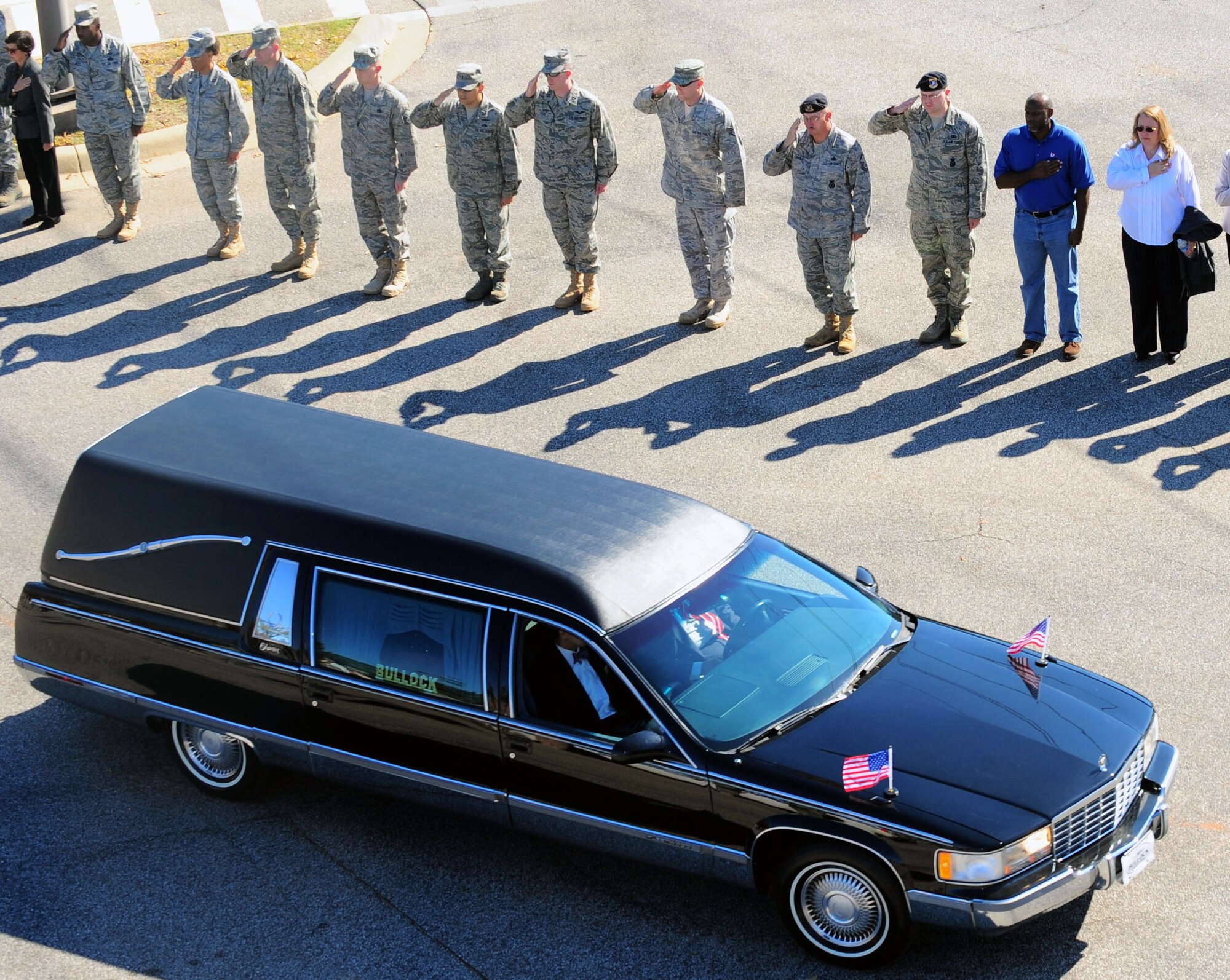 101118-F-8454M-013
SHAW AIR FORCE BASE S.C. -- Thousands of Team Shaw members lined the streets Nov. 18 to pay their last respects to a fallen Airman from Dalzell, S.C. Staff Sgt. Andrew Bubacz, 97th Communications Squadron, Altus Air Force Base, Okla. died Nov. 12, 2010, while deployed to Nuristan, Afghanistan on a provincial reconstruction team. Dalzell is just north of Shaw. (U.S. Air force photo/Senior Airman David Minor)