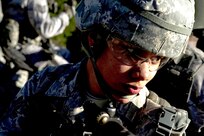 Senior Airman Rodshede Roberts scans the terrain for improvised explosive devices during convoy training Nov. 4 at Camp Bullis. Airmen attending Combat Leadership Course gain leadership experience from classroom and field training in land navigation, convoy operations, mounted and dismounted patrols and urban warfare. (U.S. Air Force photo/Staff Sgt. Jonathan Snyder)   

  