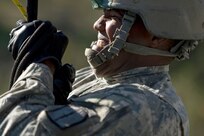 Army Sgt. Damion Starling, Special Operations Medical Detachment, attempts to self rescues during rappel masters certification course Nov. 5 at Camp Bullis. Individuals attending the five day rappel course learn 13 different knots, how to self rescue if stuck and descend down the wall and free side safely. (U.S. Air Force photo/Staff Sgt. Jonathan Snyder)   