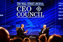 Defense Secretary Robert M. Gates (right) answers questions from Gerald F. Seib, the Wall Street Journal's executive Washington editor, before a large audience at the newspaper's CEO Council Nov. 16, 2010, in Washington, D.C. The interview focused on upcoming budget cuts within the department. Mr. Seib also is the Wall Street Journal's assistant managing editor. (Department of Defense photo/R. D. Ward)
