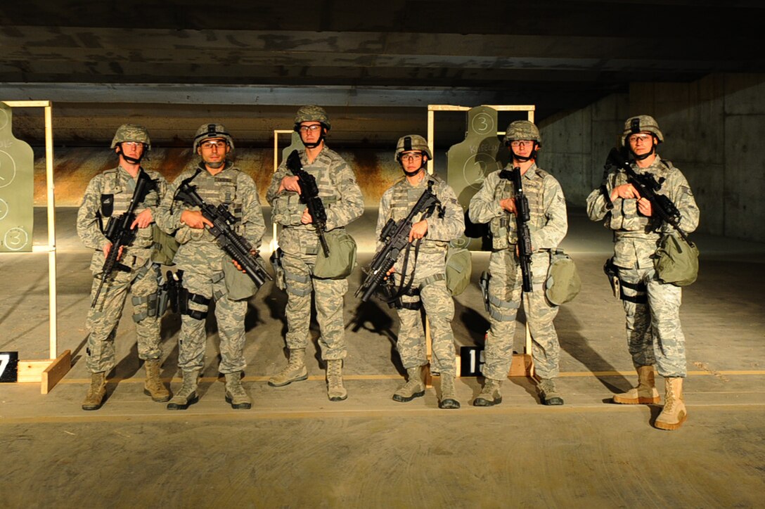 ELLSWORTH AFB, S.D. – The 28th Security Forces Squadron team stand ready to compete in this year’s Global Strike Challenge at Barksdale Air Force Base, LA. The challenge pits missile and bomb crews, security forces, and maintainers from five Air Force Bases in head-to-head competitions as each seek to be recognized as the “best of the best.” (From left to right) Tech. Sgt. Joseph Wengler, Staff Sgt. Jacob Lacefield, Airman 1st Class Brian Turney, Senior Airman Johnathan Byron, Airman 1st Class Aaron Simpson, Staff Sgt. Tyson Steiger and Senior Airman Michael Thompson (not pictured) will be tested on tactical movements, firing skills and security knowledge during the challenge. (U.S. Air Force photo/Senior Airman Kasey Close)