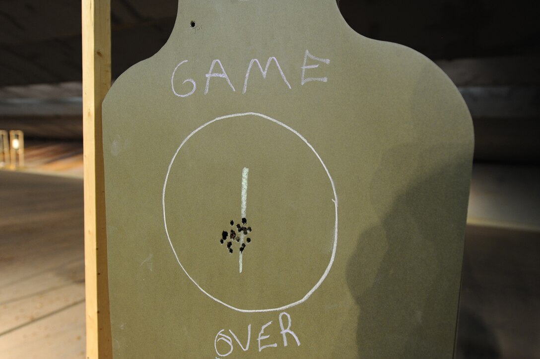 ELLSWORTH AFB, S.D. – A team of seven, from the 28th Security Forces Squadron, say, “game over” as they prepare to compete in the Global Strike Challenge, Nov. 9. The challenge pits missile and bomb crews, security forces, and maintainers from five Air Force Bases in head-to-head competitions as each seek to be recognized as the “best of the best.” (U.S. Air Force photo/Senior Airman Kasey Close)