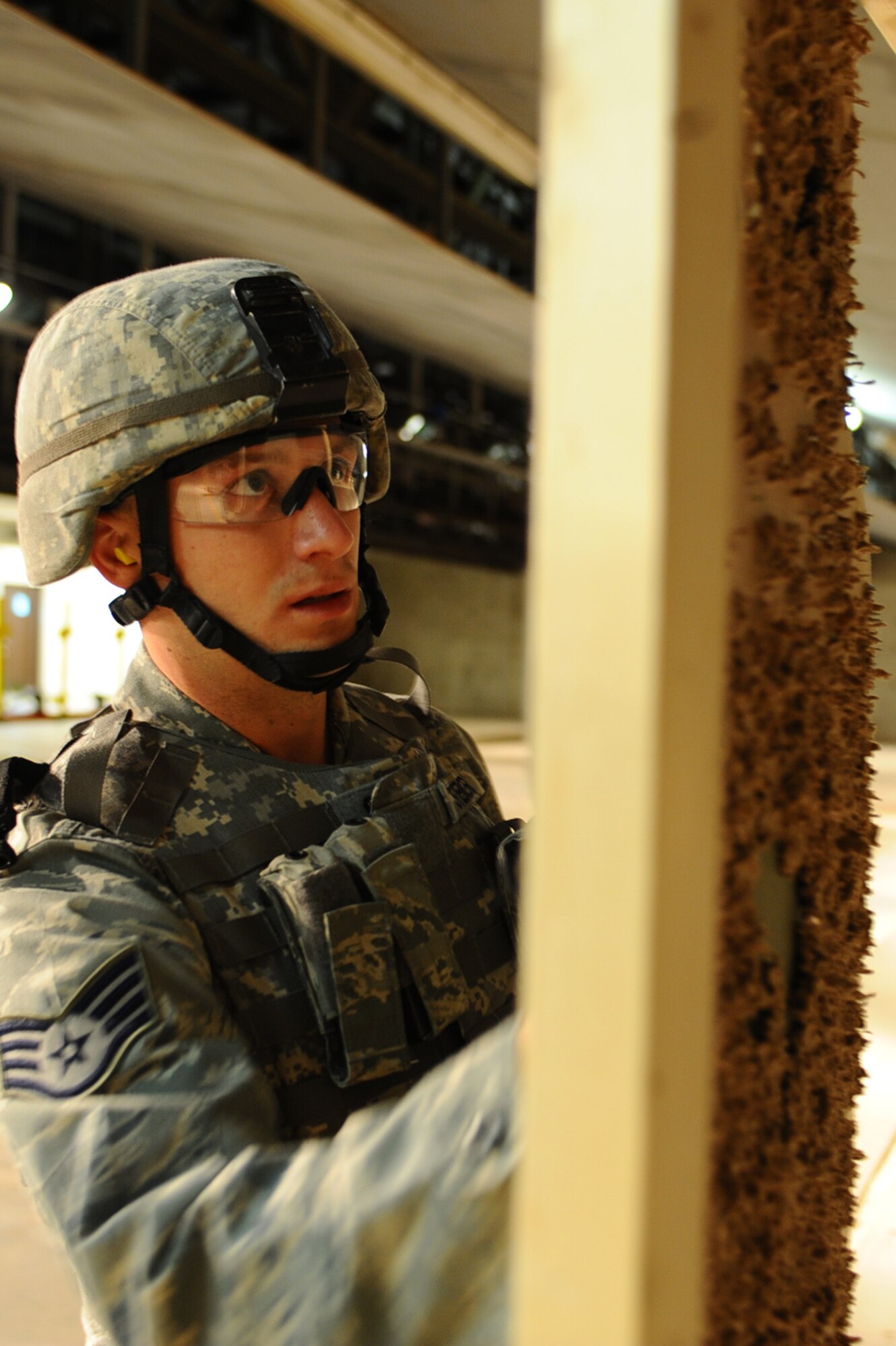 ELLSWORTH AFB, S.D. – Staff Sgt. Tyson Steiger, 28th Security Forces Squadron assistant unit deployment manager, calculates the score of an Airman shooting, Nov. 9. Sergeant Steiger is part of a seven person team who will be participating in the Global Strike Challenge, Nov. 13 through 16. The challenge pits missile and bomb crews, security forces, and maintainers from five Air Force Bases in head-to-head competitions as each seek to be recognized as the “best of the best.” (U.S. Air Force photo/Senior Airman Kasey Close)