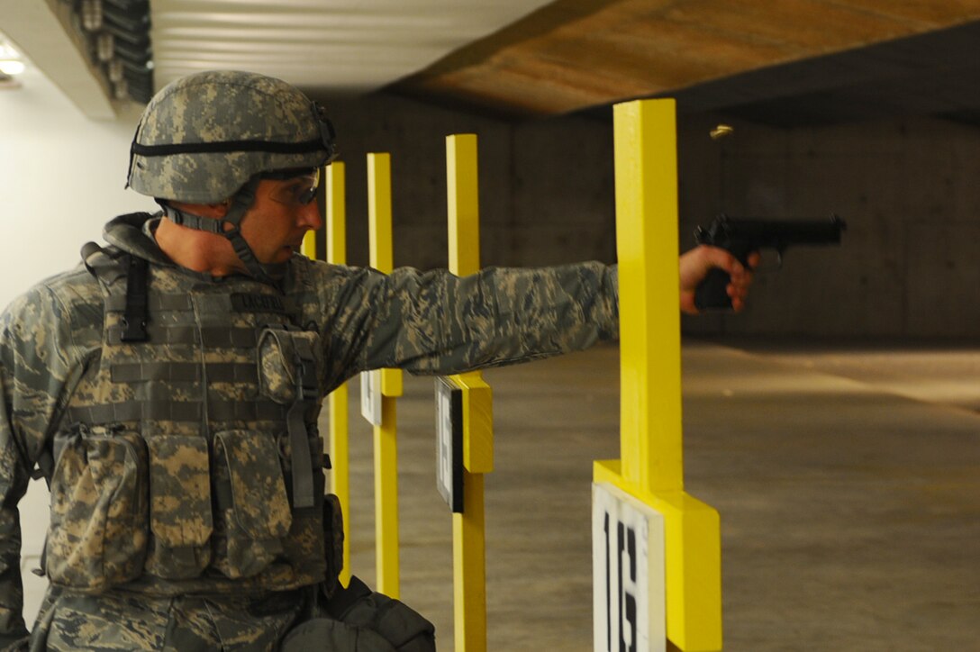 ELLSWORTH AFB, S.D. – Staff Sgt. Jacob Lacefield, 28th Security Forces Squadron NCO in-charge of confinement, fires an M-9 Beretta while using his weak hand at a target, Nov. 9. Sergeant Lacefield participate in firing drills in preparation for the Global Strike Challenge, Nov. 13 through 16. The challenge pits missile and bomb crews, security forces, and maintainers from five Air Force Bases in head-to-head competitions as each seek to be recognized as the “best of the best.” (U.S. Air Force photo/Senior Airman Kasey Close)