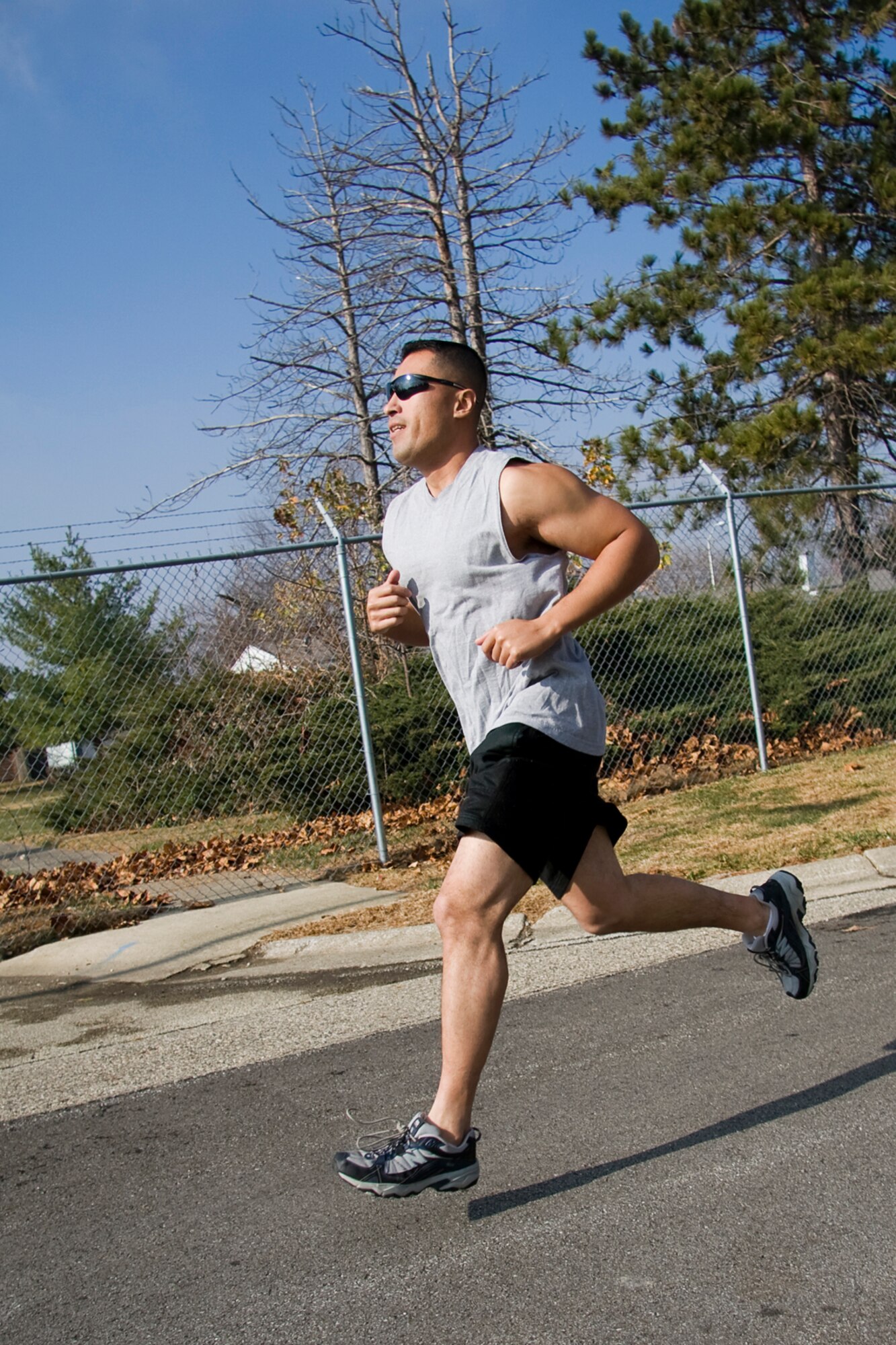 GRISSOM AIR RESERVE BASE, Ind. -- Getting into a good stride, Juan Hernandez starts off his race during a "Turkey Trot" 5-kilometer run held here Nov. 17. Participants guessed how long it would take them to finish the race prior to starting. The top three runners whose guesses were closest to their actual run time received a turkey. Hernandez finished with a time of 22 minutes, 48 seconds, which was only 57 seconds off from his guess. Raymond McNitt and Rich Percival also took home turkeys from the competition. Participants included Air Force Reserve, Marine Corps Reserve, civilian and contractor personnel. (U. S. Air Force photo/Tech. Sgt. Mark R. W. Orders-Woempner)
