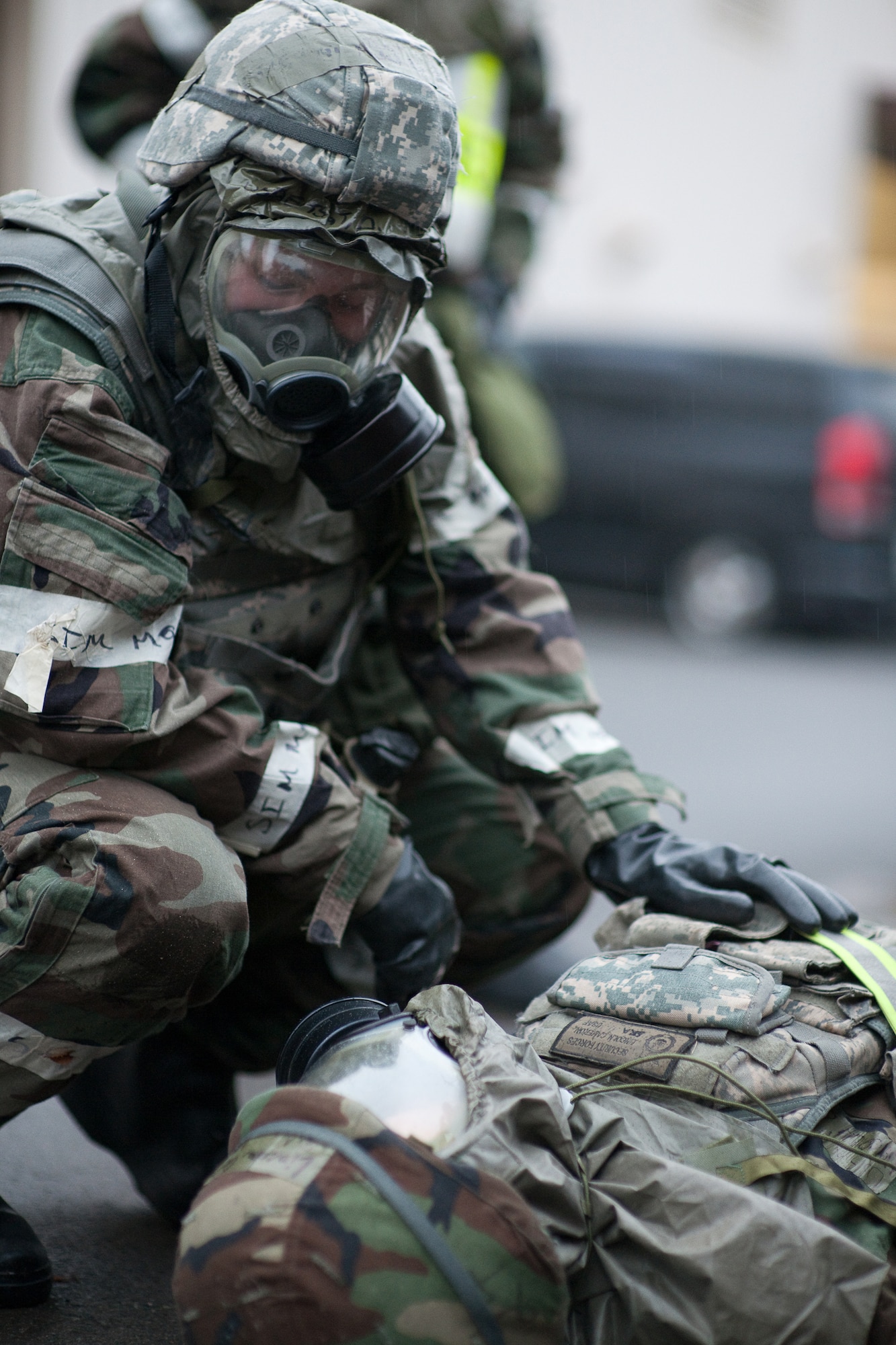 YOKOTA AIR BASE, Japan -- Tech. Sgt. Ann Schenck, 374th Security Forces Squadron,  performs self-aid and buddy care on a simulated casualty here Nov. 17 during Phase 2 of the wing's Operational Readiness Exercise. (U.S. Air Force photo/Osakabe Yasuo)