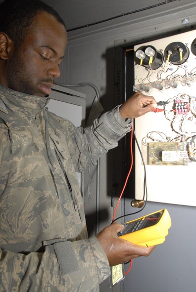 KUNSAN AIR BASE, Republic of Korea -- Senior Airman Damarcus Lamons, 8th Communications Squadron radar technician, tests the magnetron of the airport surveillance radar Nov. 17. The squadron maintains the ASR, which allows aircraft controllers to monitor all aircraft within approximately 240 miles of the base. (U.S. Air Force photo/Staff Sgt. Amanda Savannah