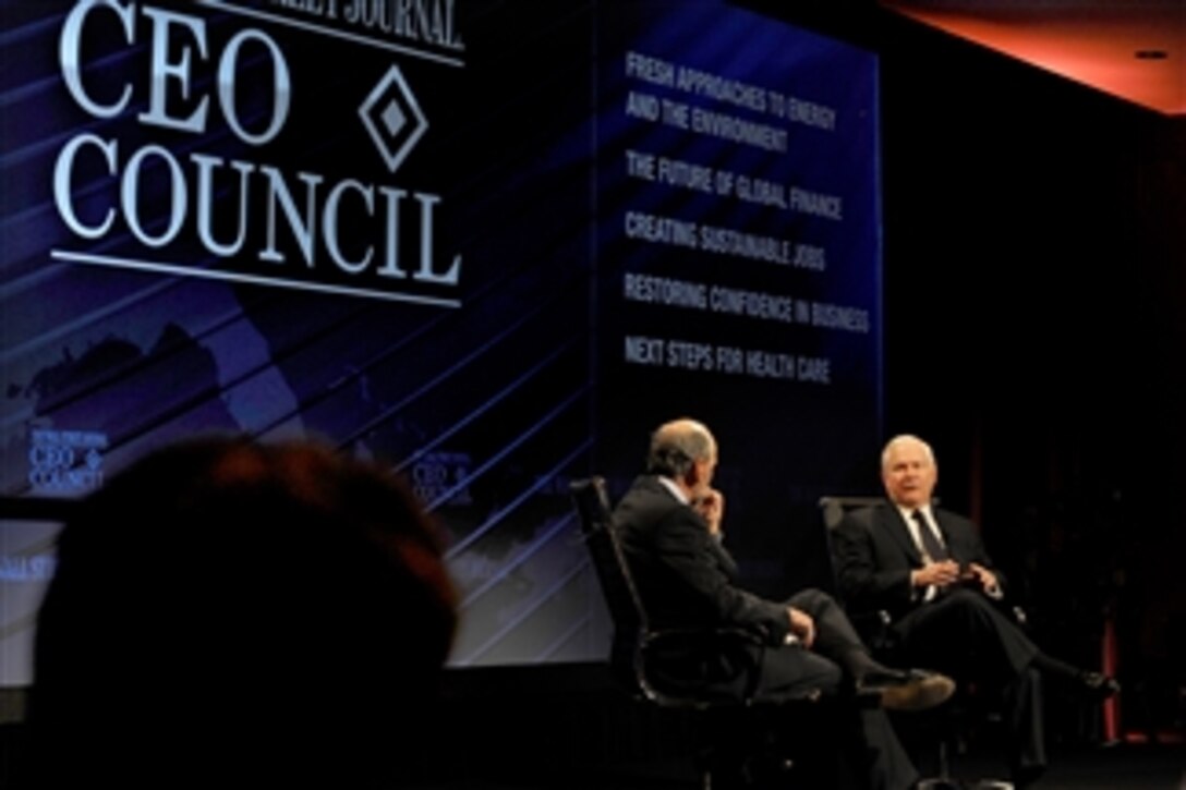 Secretary of Defense Robert M. Gates (right) answers questions presented by interviewer Gerald Seib (left) at the Wall Street Journal-sponsored CEO Council event held at the Four Seasons Hotel in Washington, D.C., on Nov. 16, 2010.  Seib is the assistant managing editor and executive Washington editor of The Wall Street Journal.  
