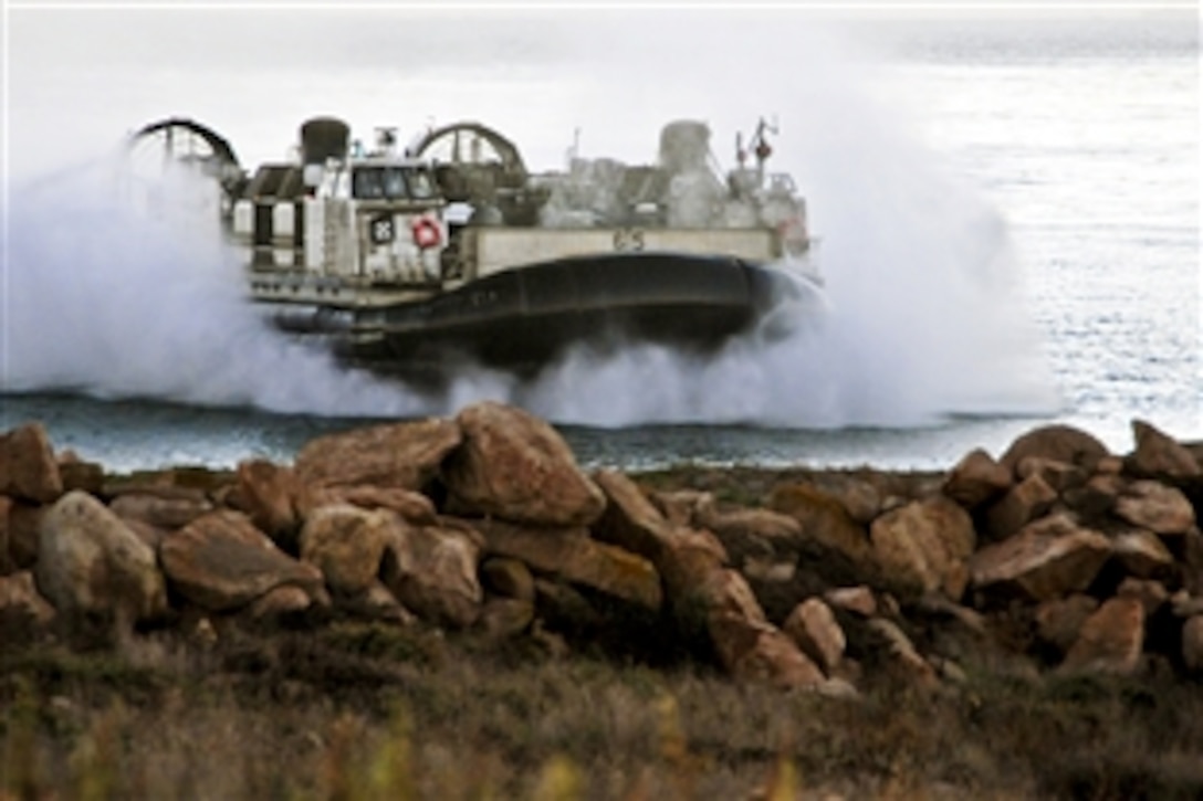 A landing craft air cushion prepares to offload personnel and equipment from the 13th Marine Expeditionary Unit as it lands on San Clemente Island, Calif., Nov. 15, 2010. The landing craft is assigned to Assault Craft Unit 5 embarked aboard the amphibious assault ship USS Boxer; both are participating in training to prepare for a deployment.