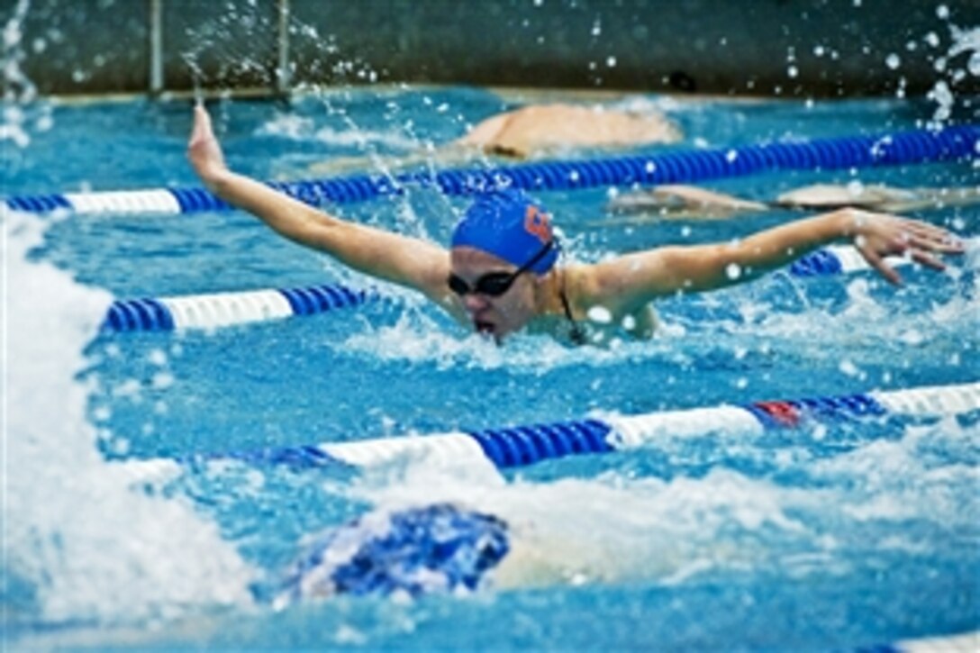 U.S. Coast Guardmen 3rd Class Cadet Erin Talbot practices in the swimming pool at the Coast Guard Academy in New London, Conn., Nov. 17, 2010. Talbot is on the Board of Trustees List, the most prestigious honor at the Coast Guard Academy, and is among the top 1 percent in the rankings of the more than 1,000 cadets at the academy. 