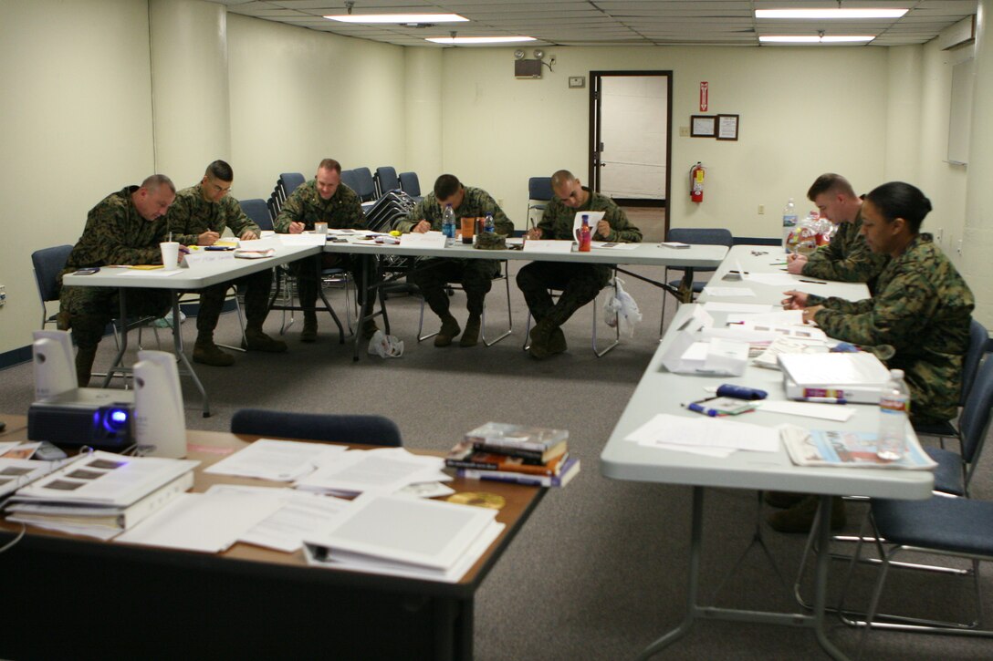 Marines, and a sailor prepare for their final presentation during Sexual Assault Prevention and Response Uniformed Victim Advocate Training Nov 18. at Marine Forces Reserve Headquarters. Each student completed the course and will also be representatives for the 24 hour a day, 7 days a week representative for the SAPR crisis hotline.