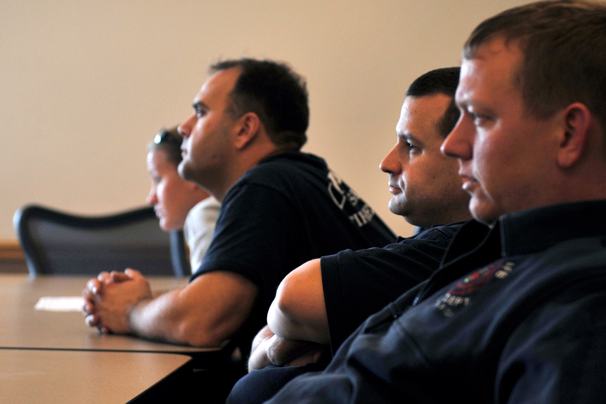 OFFUTT AIR FORCE BASE, Neb. - David Yelovich, fire fighter with the 55th Civil Engineering Squadron, and other team members listen to a briefing on fire safety inside the Offutt Fire Station Nov. 15.  Firefighters here work 24-hour shifts and respond to emergencies both on and off base. They recently sent a team to compete in the World's Firefighter Combat Challenge in South Carolina where they placed 31st out of 200 teams.

U.S. Air Force Photo by Charles Haymond (Released) 